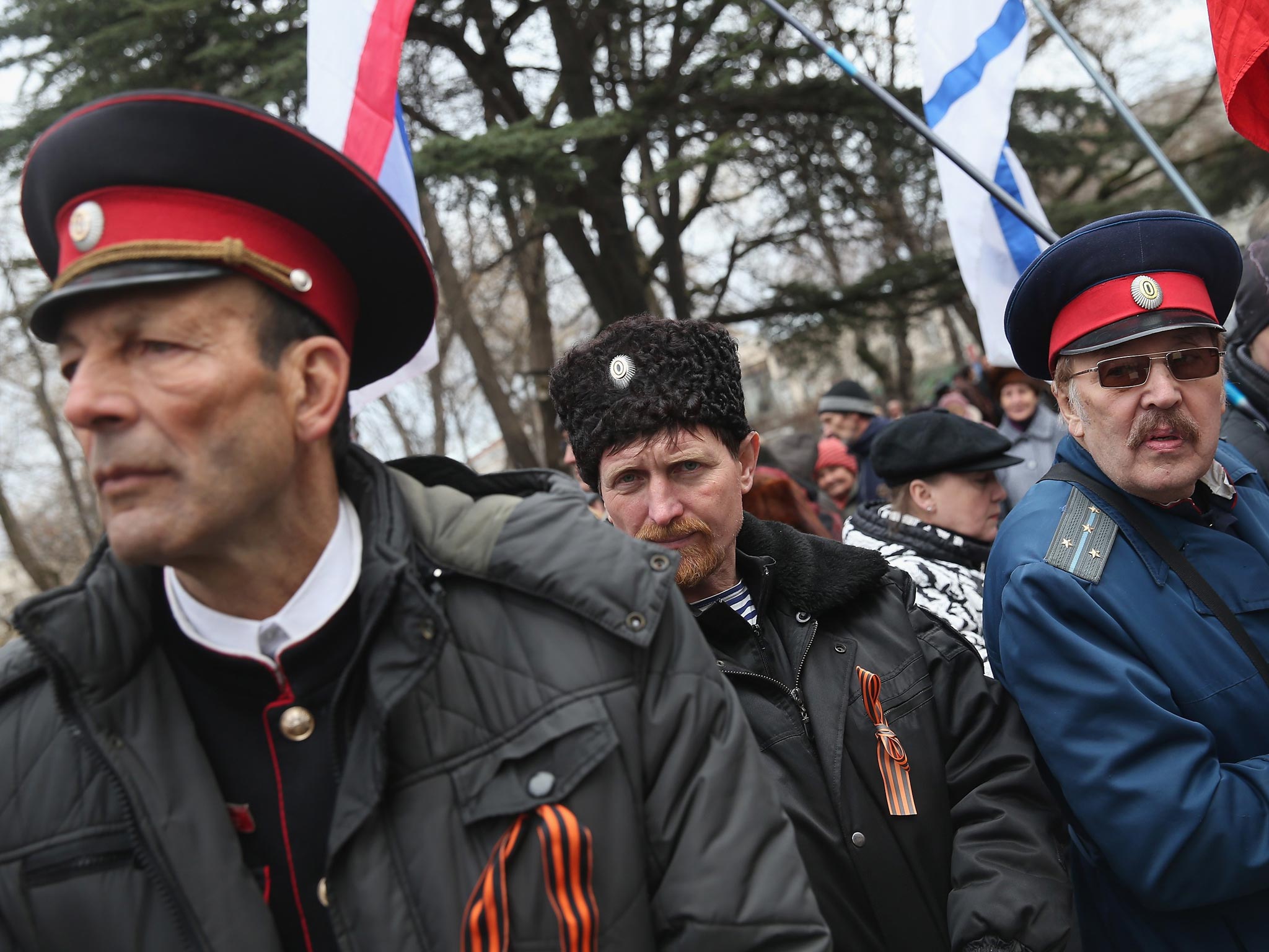 Pro-Russian Cossacks rally outside the Crimean parliament building