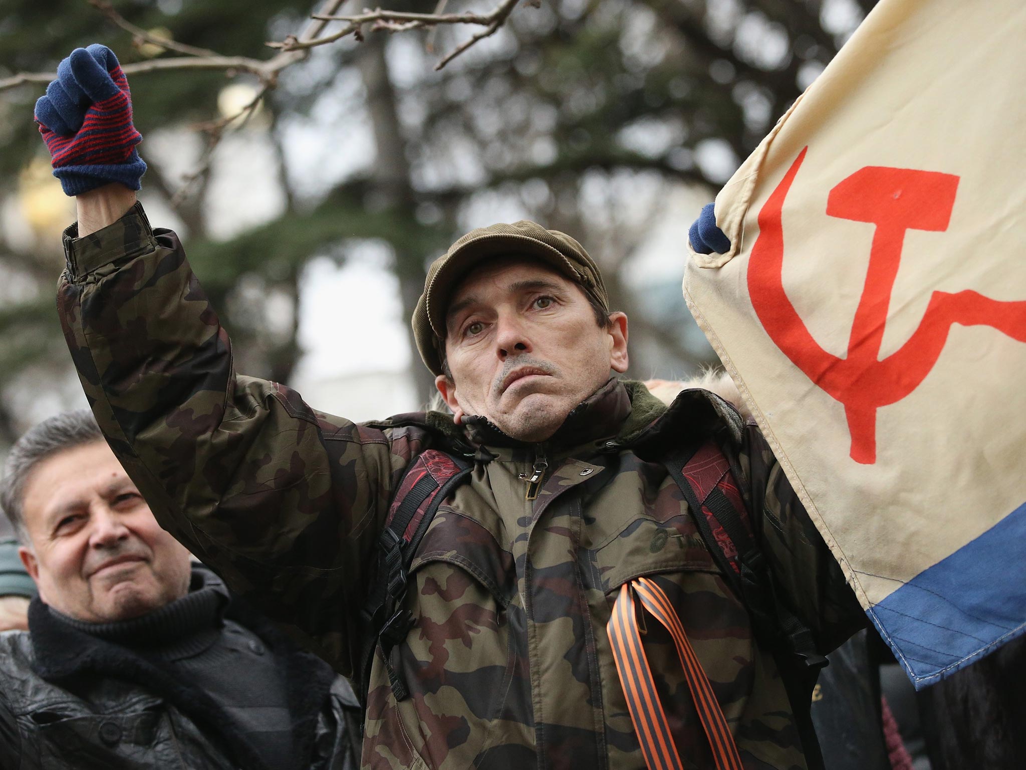 Pro-Russian supporters rally outside the Crimean parliament building