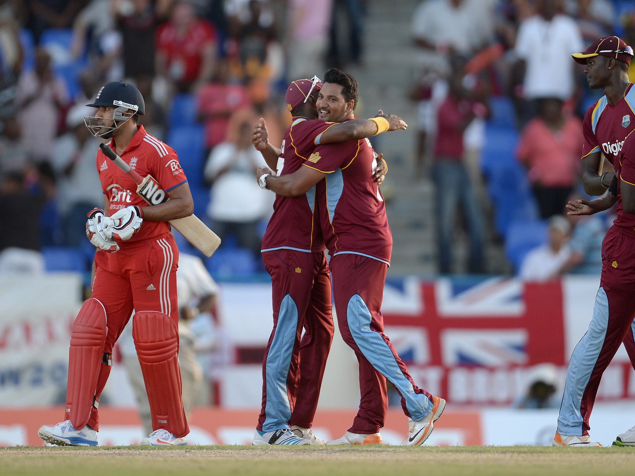 Ravi Bopara walks off during England's 15-run defeat to West Indies