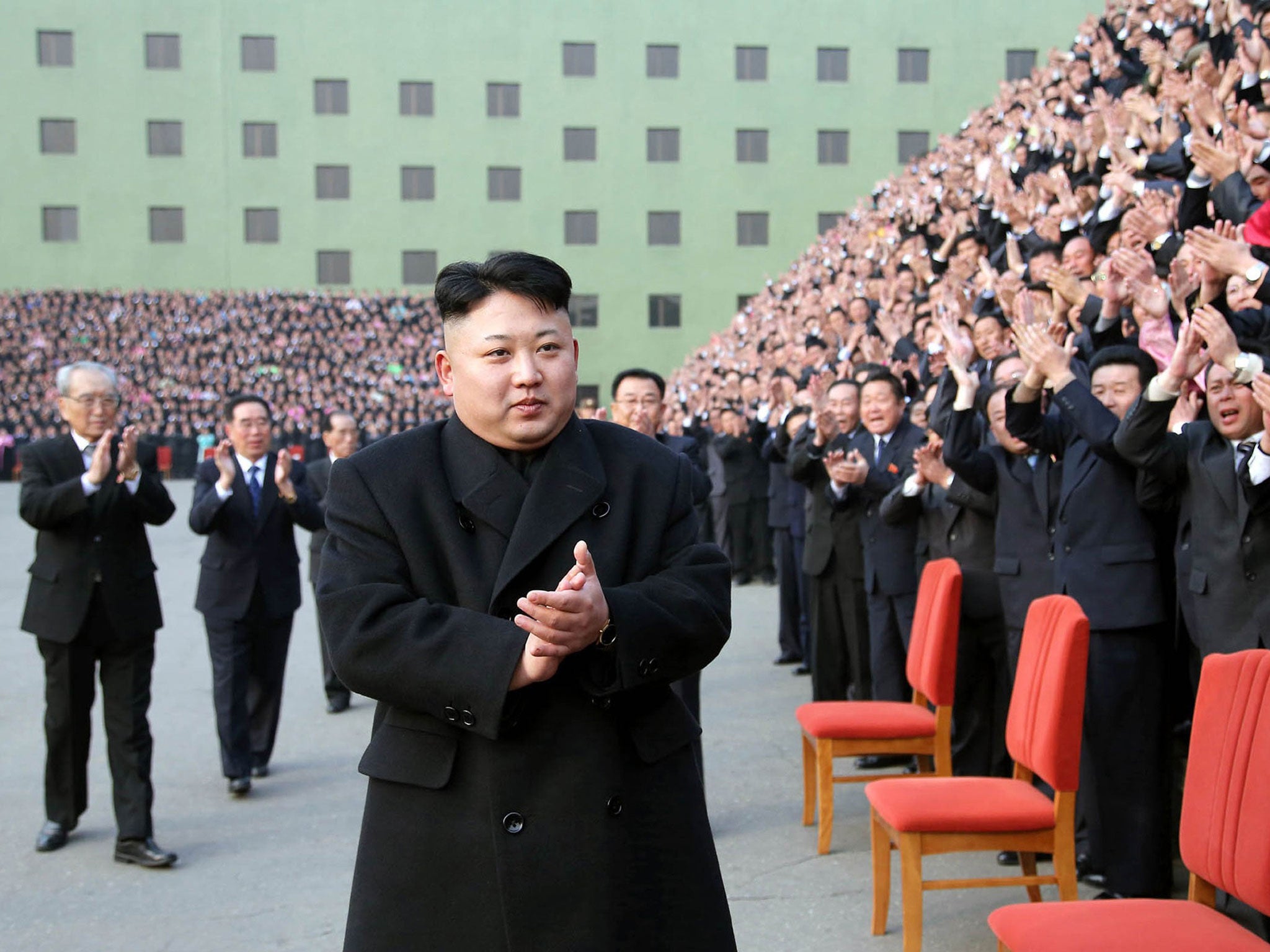 Kim Jong-Un reacts to participants of the 8th conference of the ideological officials of the Workers Party of Korea (WPK) in Pyongyang