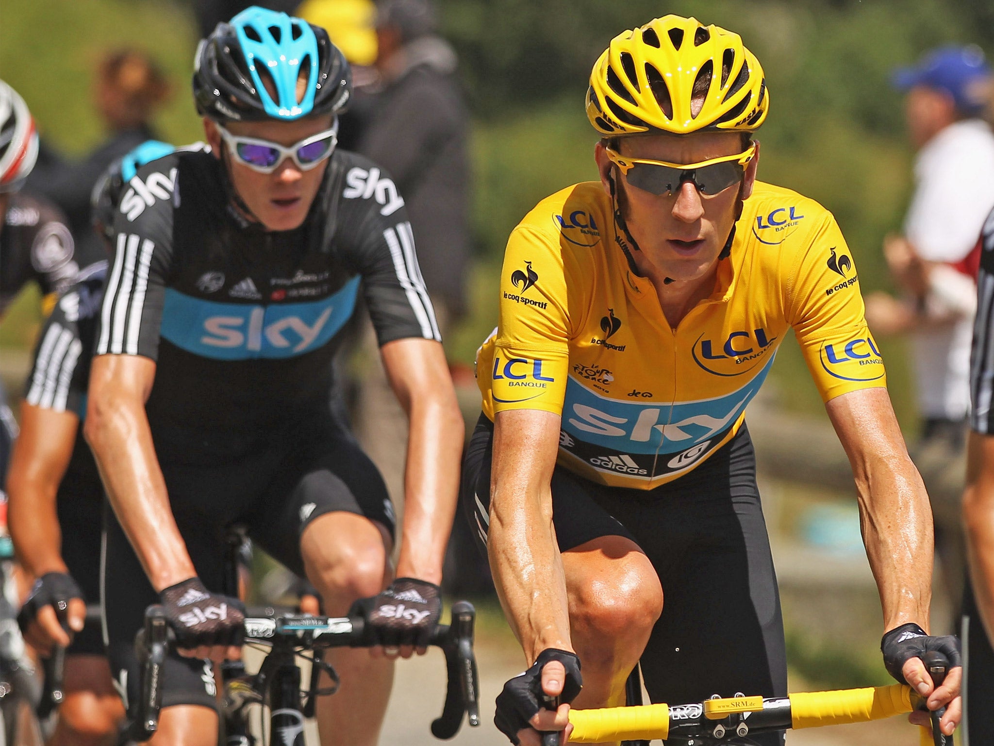 Bradley Wiggins, with the help of Chris Froome, on his way to Tour glory in 2012 (Getty)