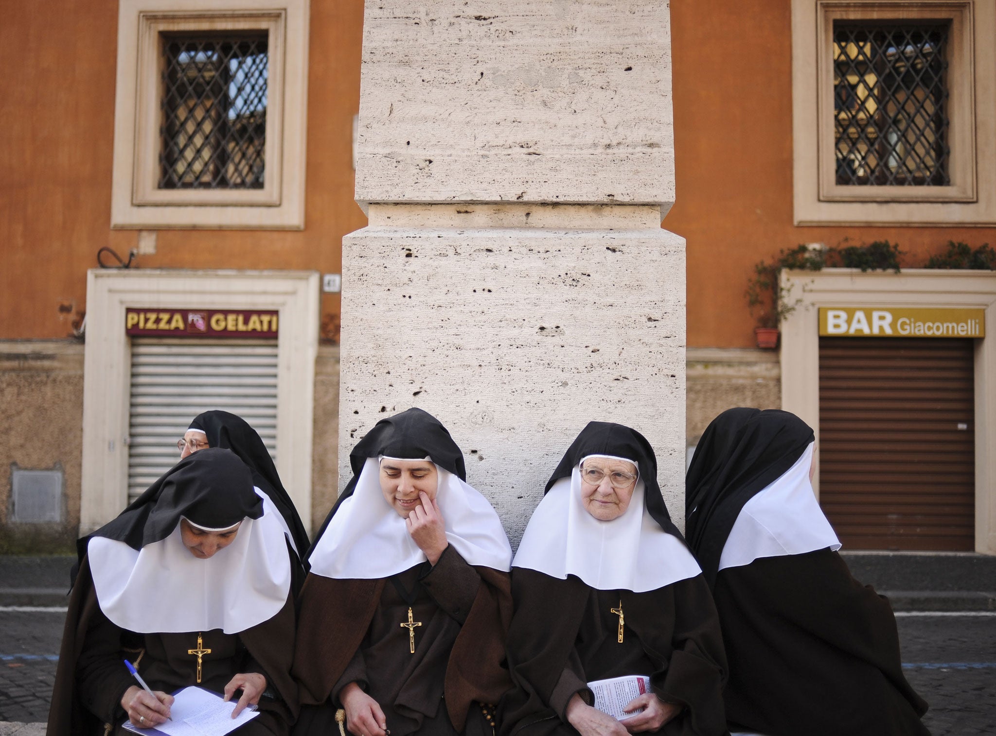 Nuns gather in St Peter's Square for Pope Francis I's inauguration mass in March 2013