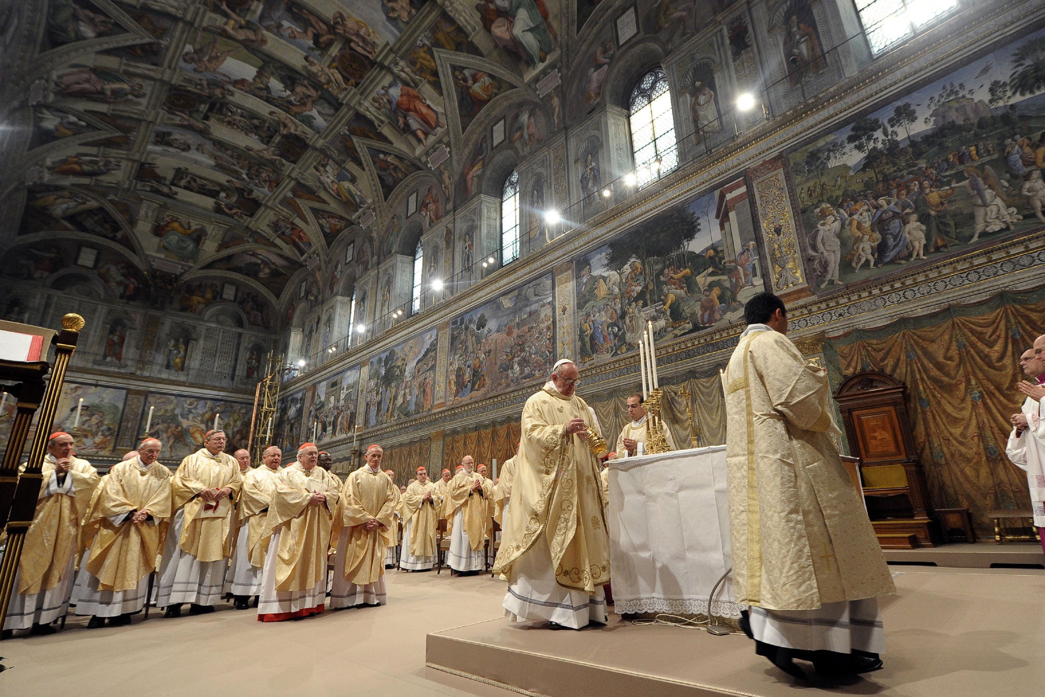 Pope Francis leading Mass at the Sistine Chapel, a day after his election