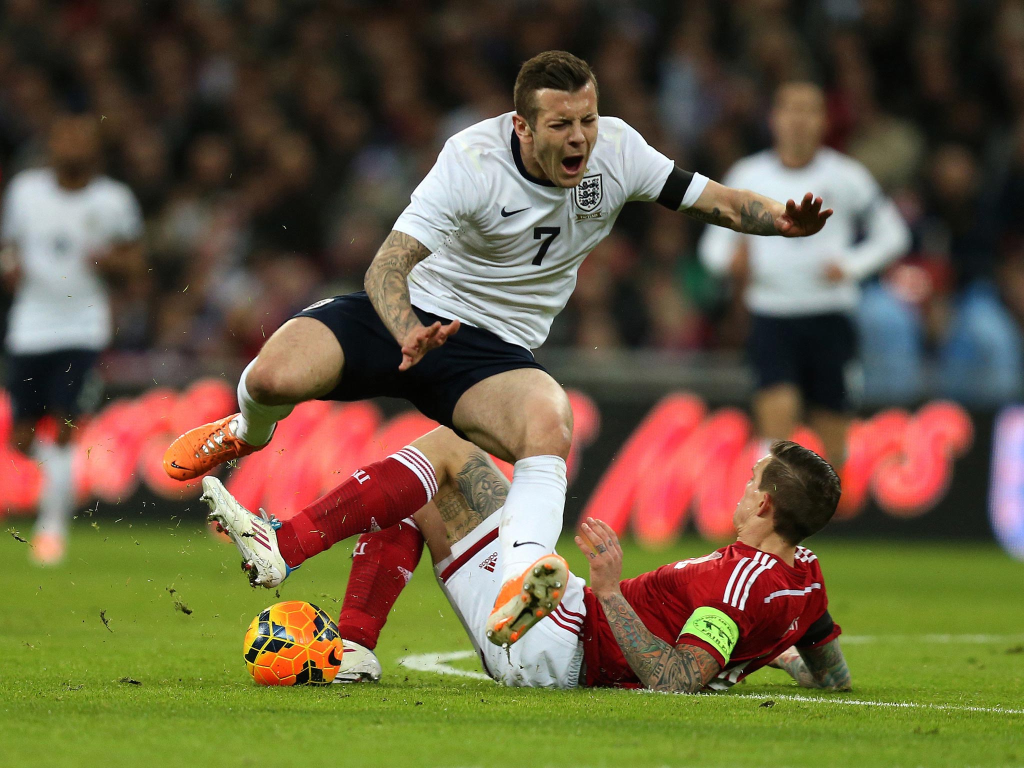 Jack Wilshere broke his foot after this challenge by Daniel Agger on Wednesday night (Getty Images)