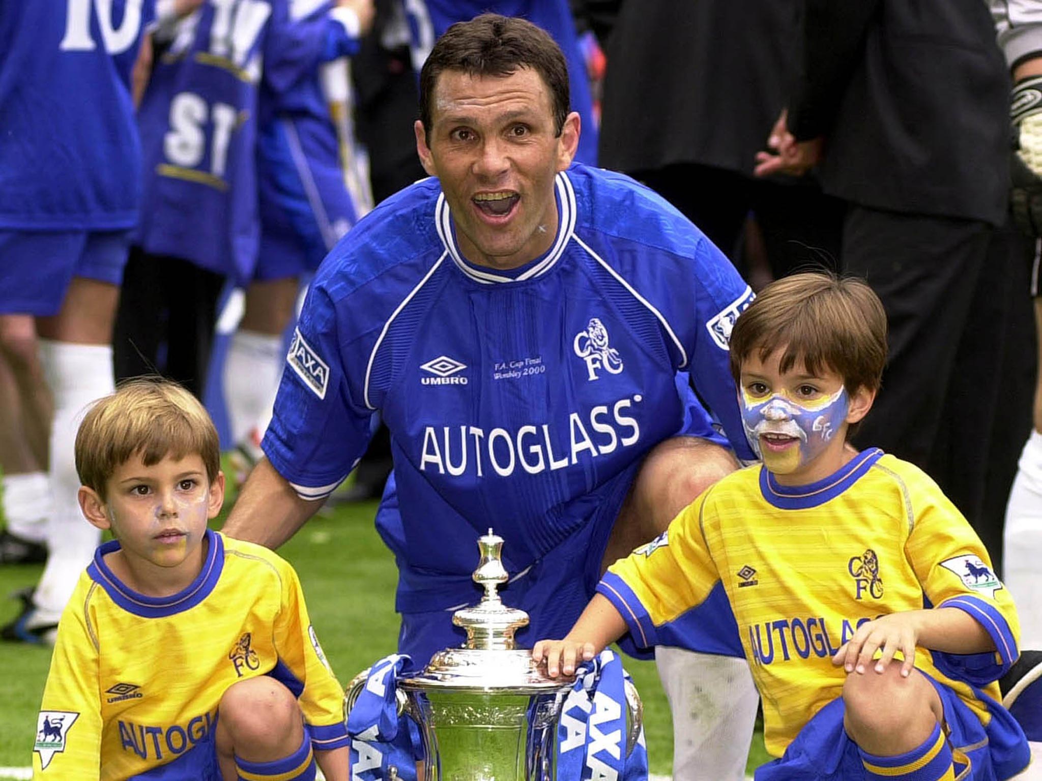 Gus Poyet with sons Diego (left) and Matias after winning the FA Cup with Chelsea back in 2000