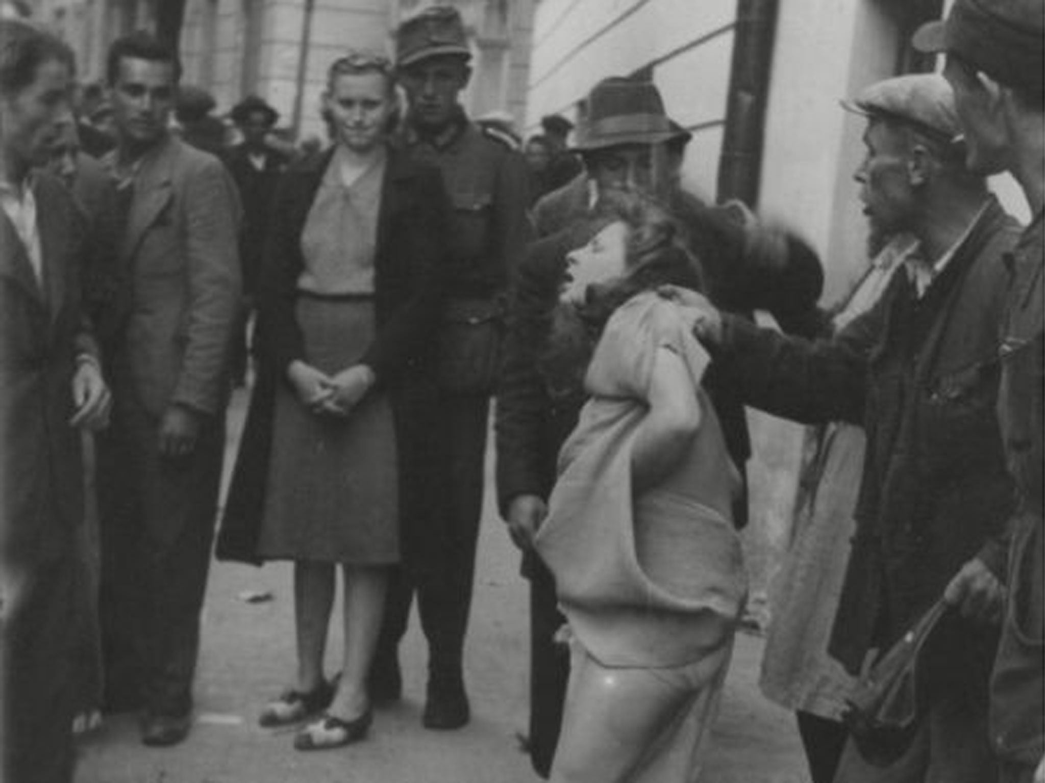 A woman is attacked during the 1941 progrom