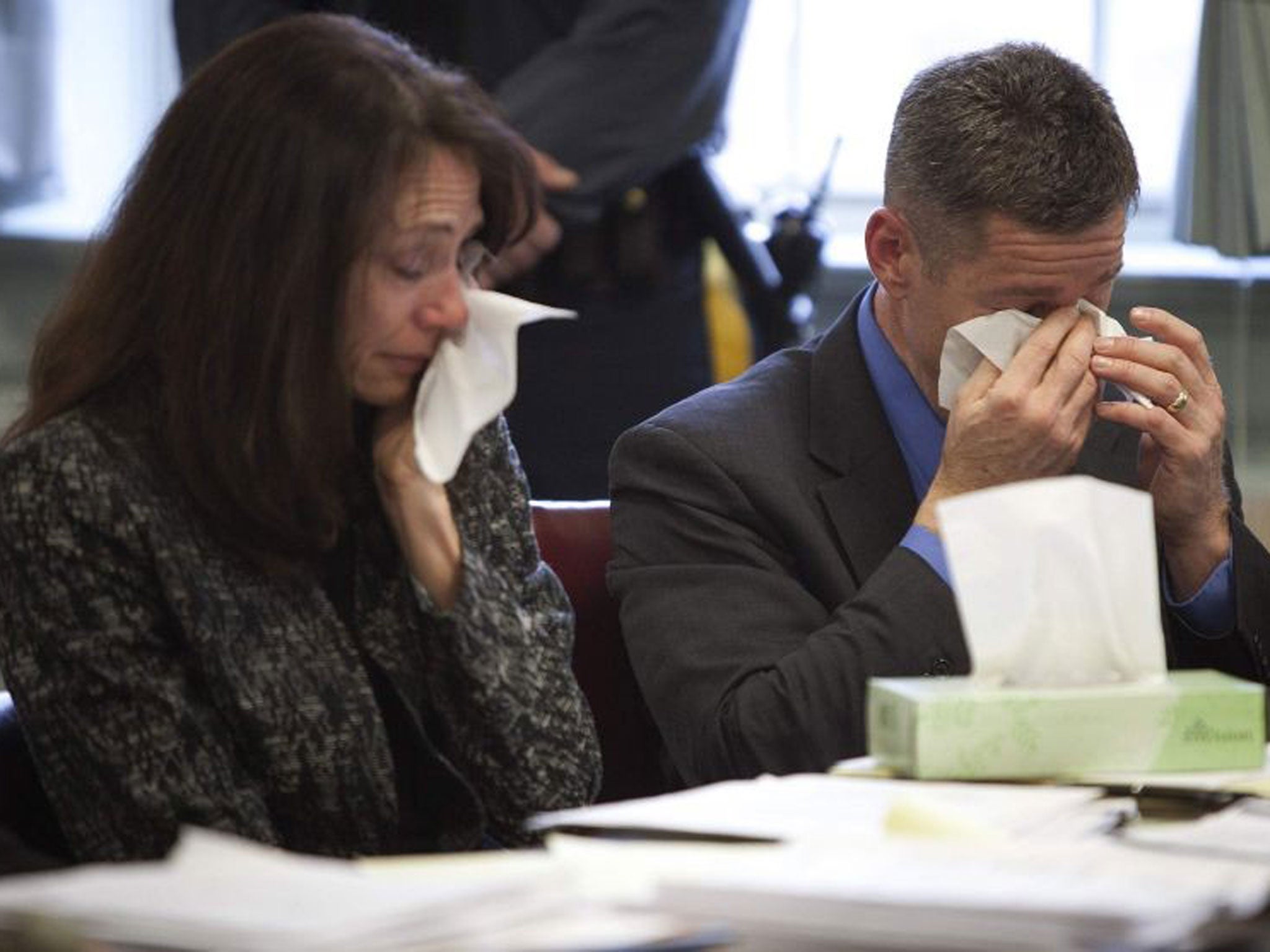 Family at war: Elizabeth and Sean Canning cry during the hearing