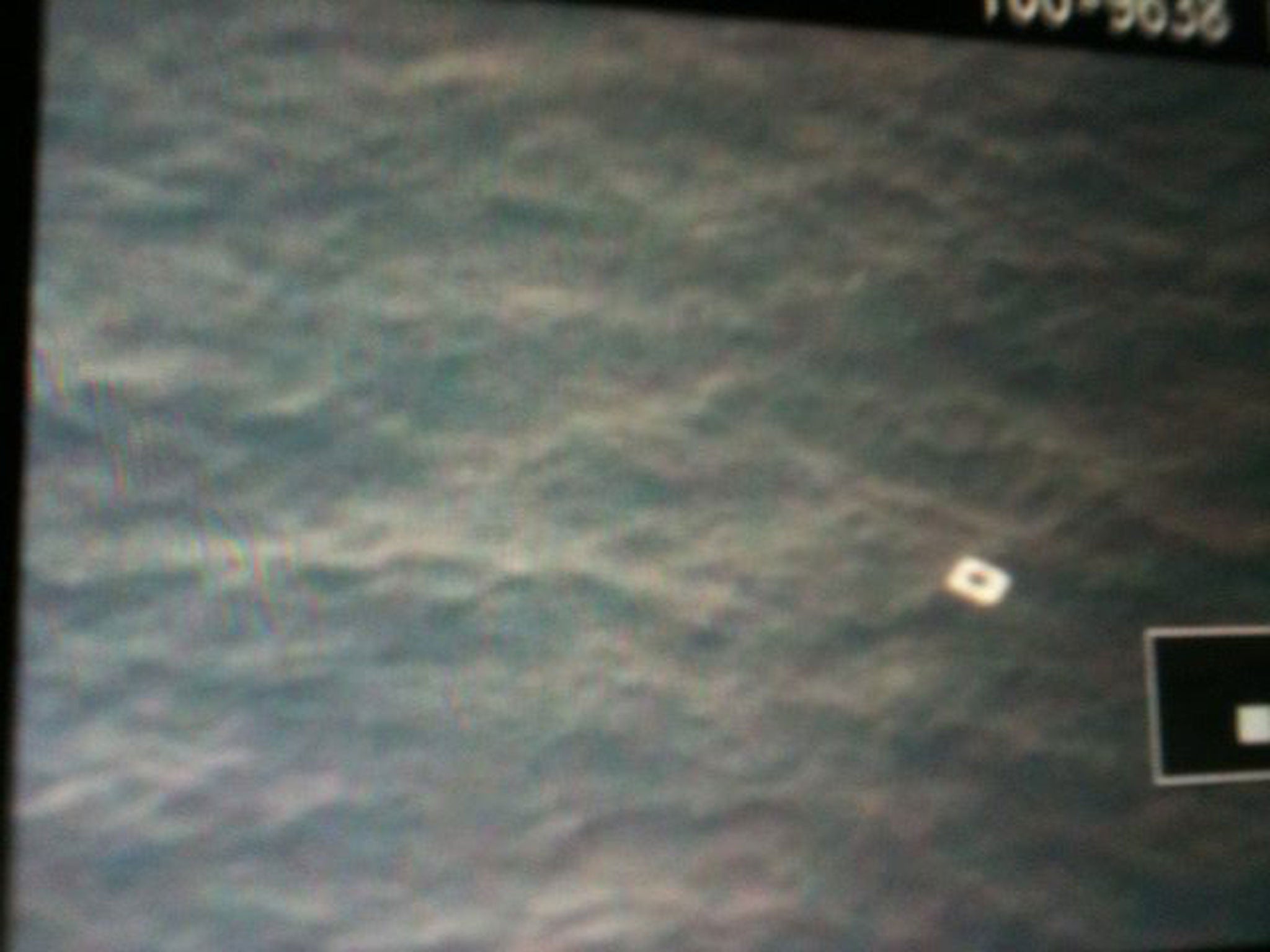 A reported sighting of a piece of debris from the plane