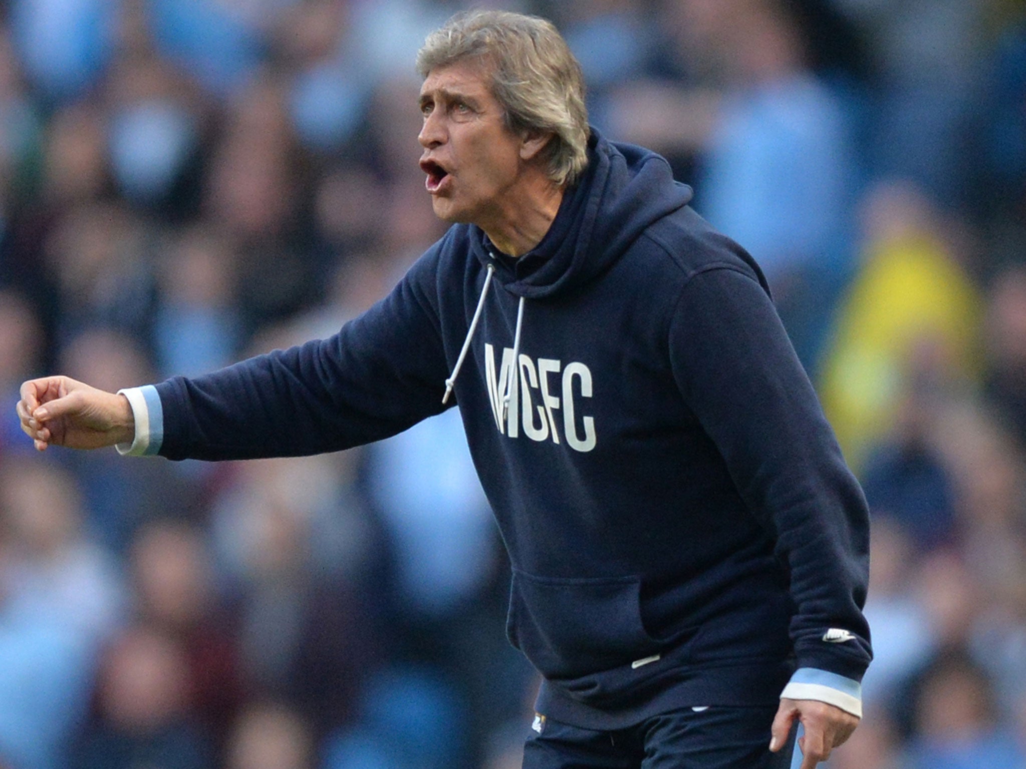 Manuel Pellergini makes a gesture from the touchline on Sunday