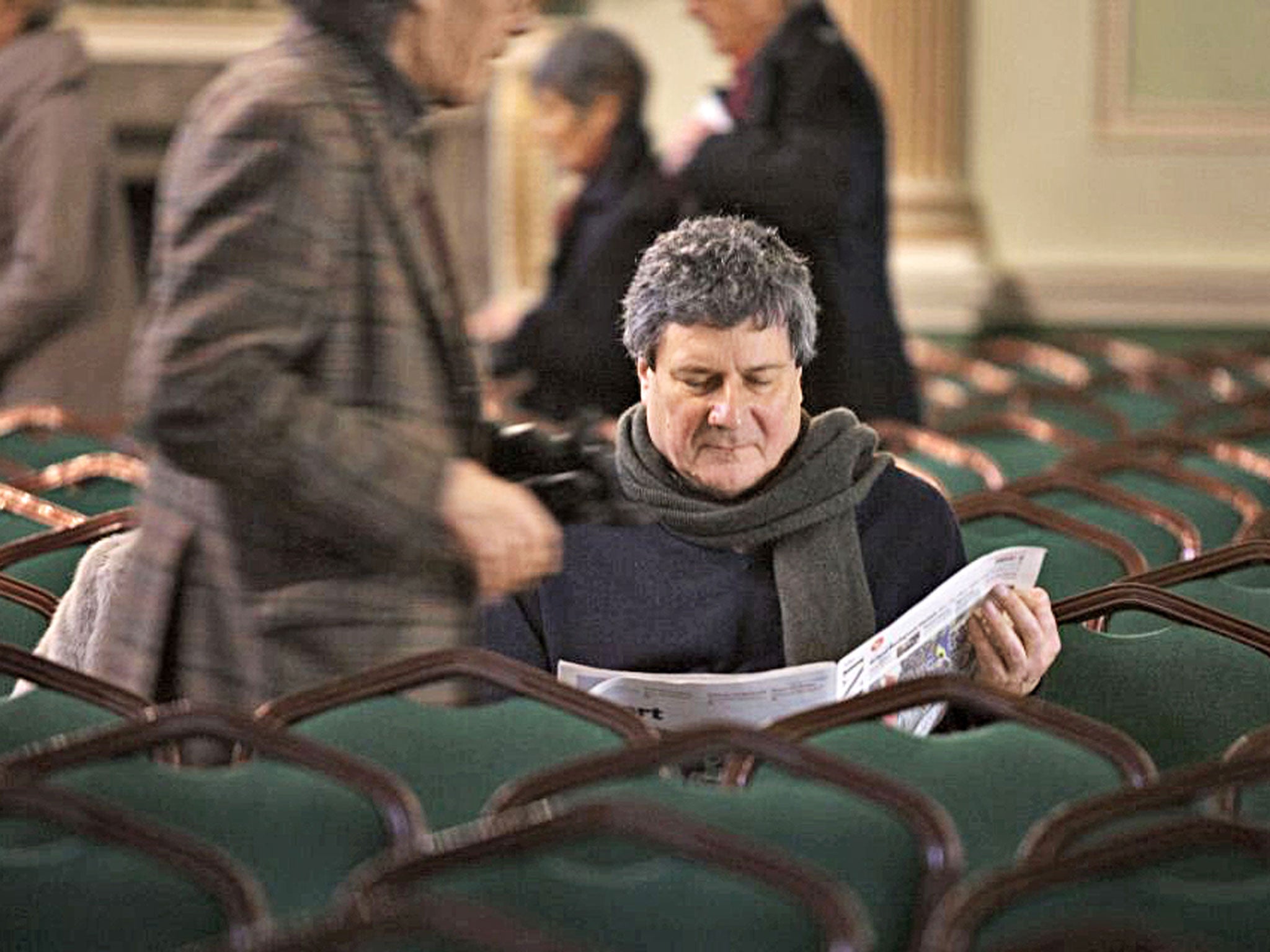 People arriving for a talk