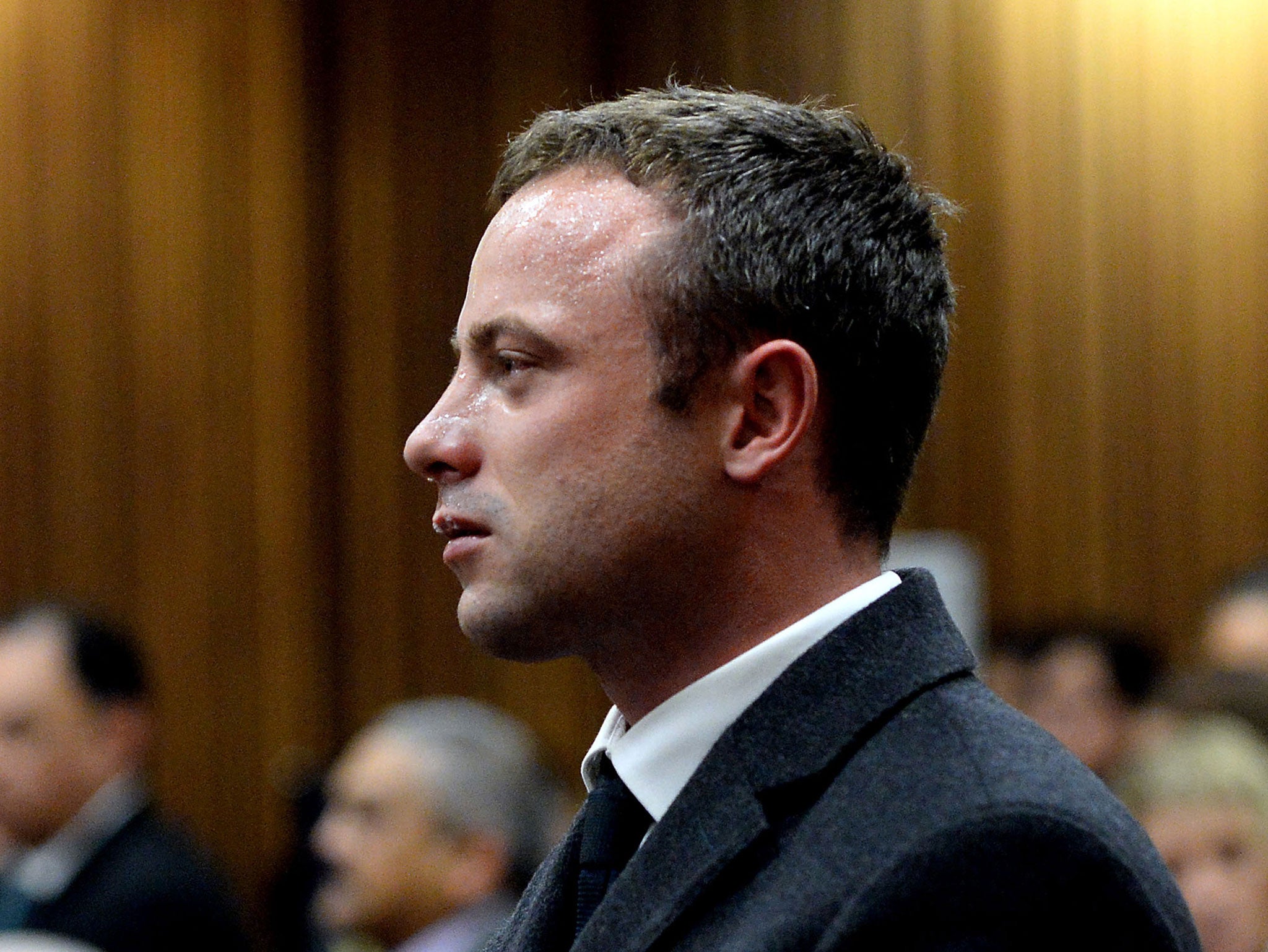 An overcome Oscar Pistorius vomited in court on Monday as he listened to harrowing expert testimony about the autopsy of his girlfriend Reeva Steenkamp, whom he is accused of murdering