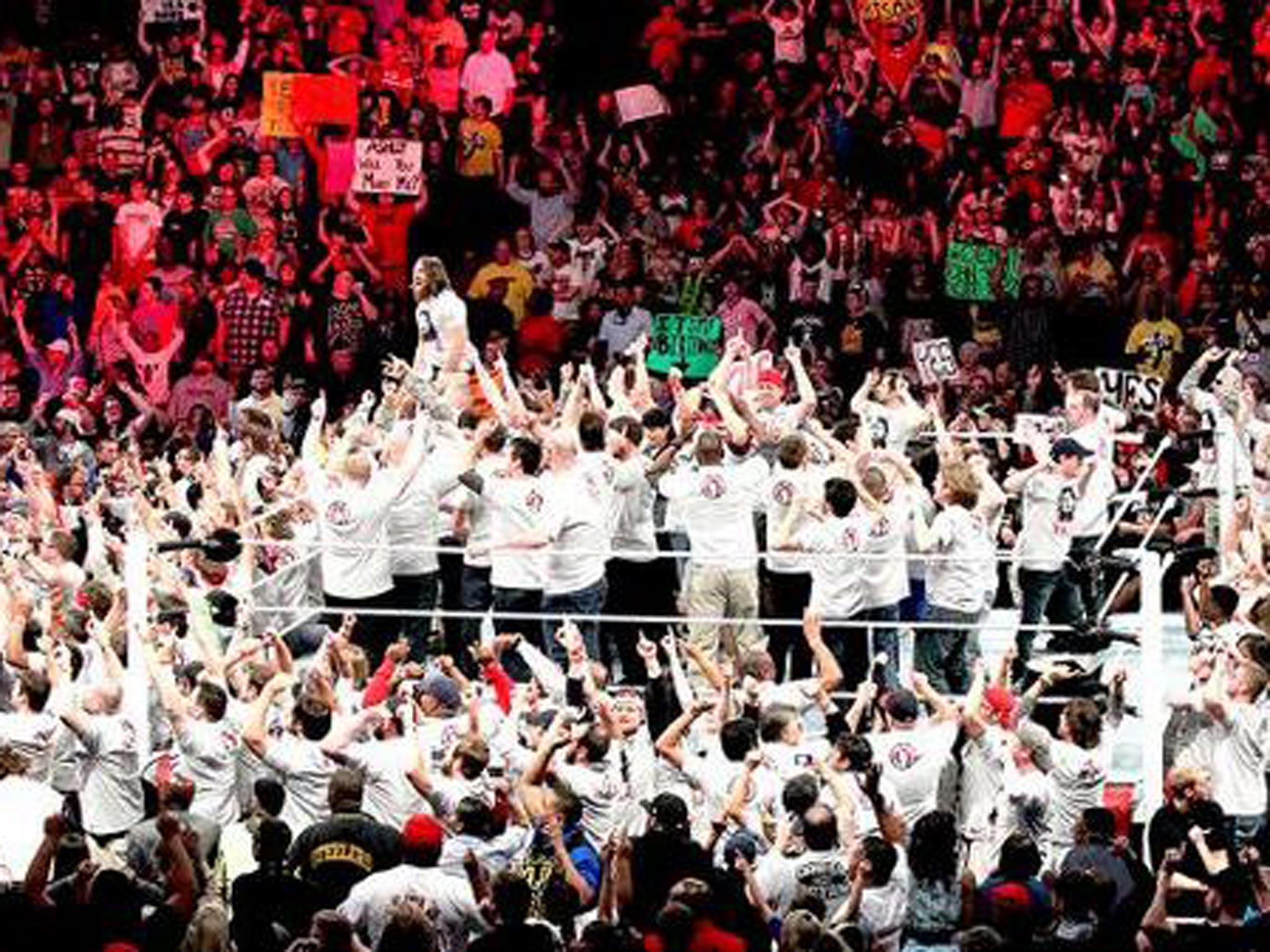 Daniel Bryan floods the ring with members of the Yes! Movement