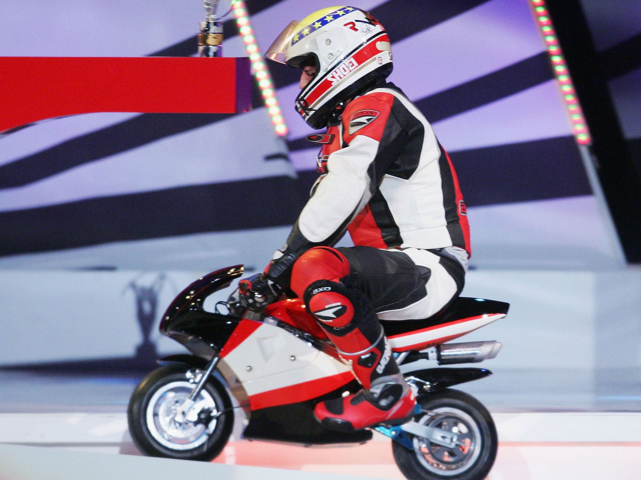 A man rides a pocket bike similar to the one ridden by the three-year-old girl in Germany.