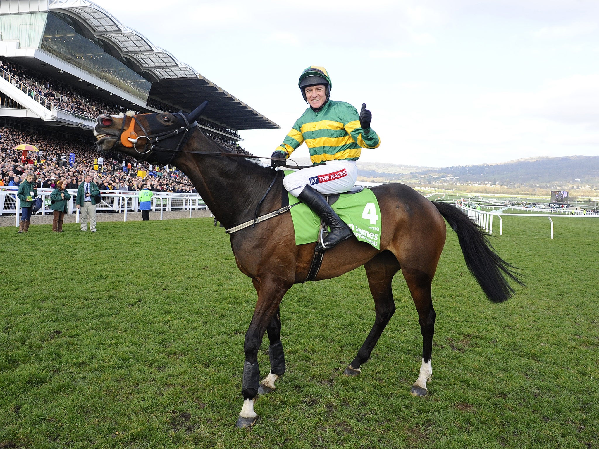 Barry Geraghty riding Jezki win The Stan James Champion Hurdle at Cheltenham