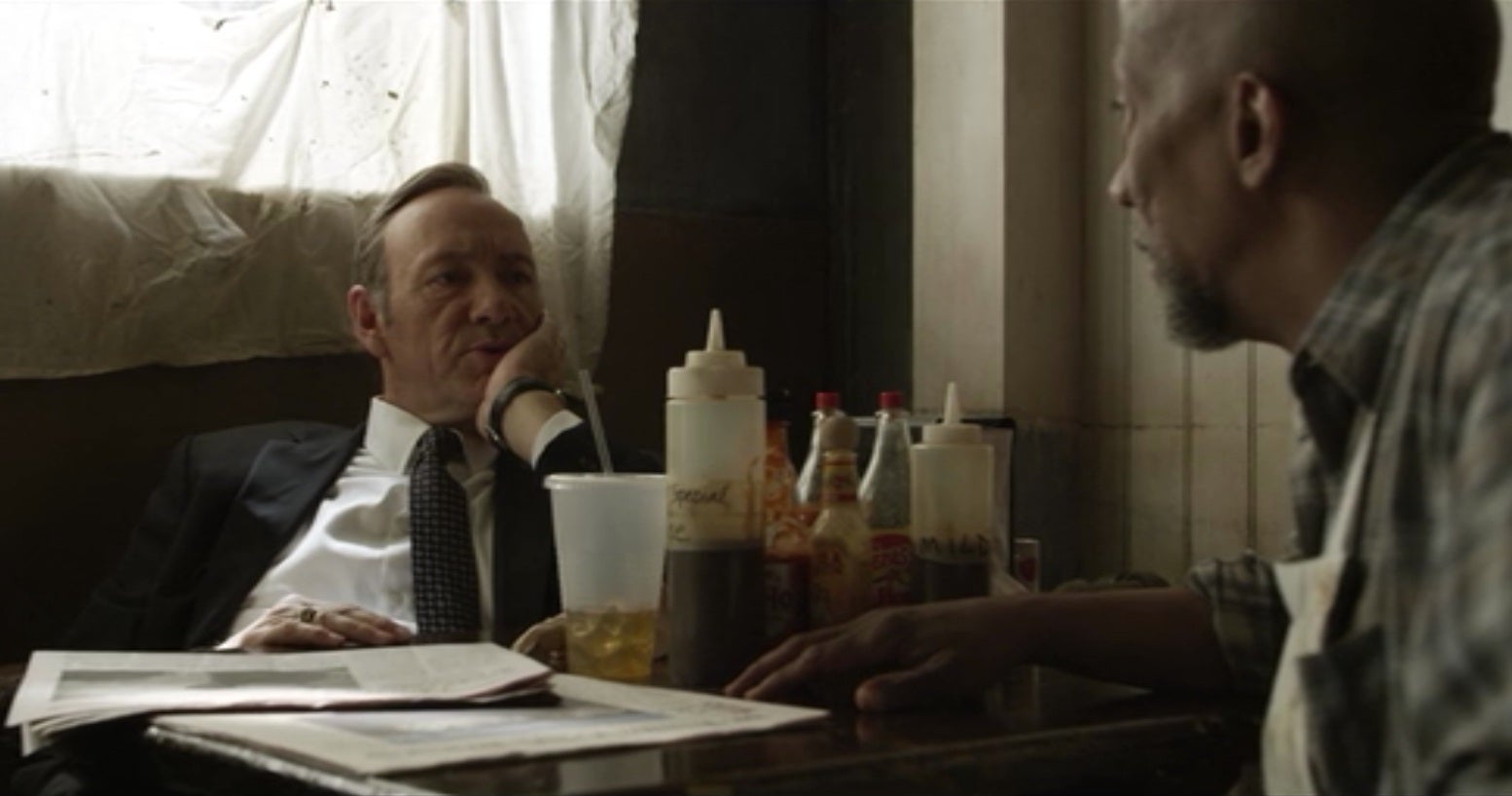 Frank (Kevin Spacey) and Freddy (Reg E. Cathey) probably talking in meat metaphors