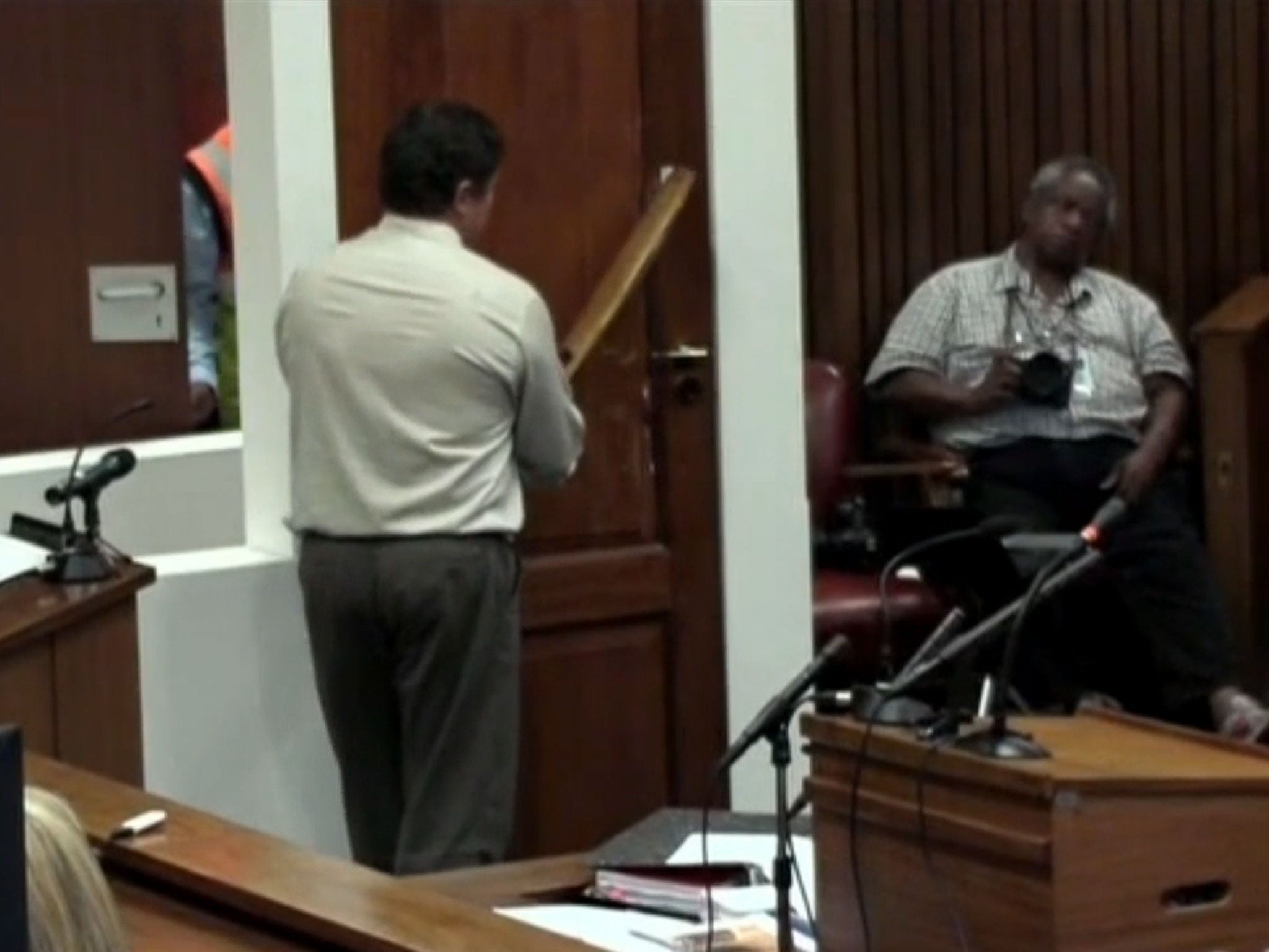 Lt Col JG Vermeulen recreates a possible scenario at Oscar Pistorius home when he shot his girlfriend Reeva Steenkamp