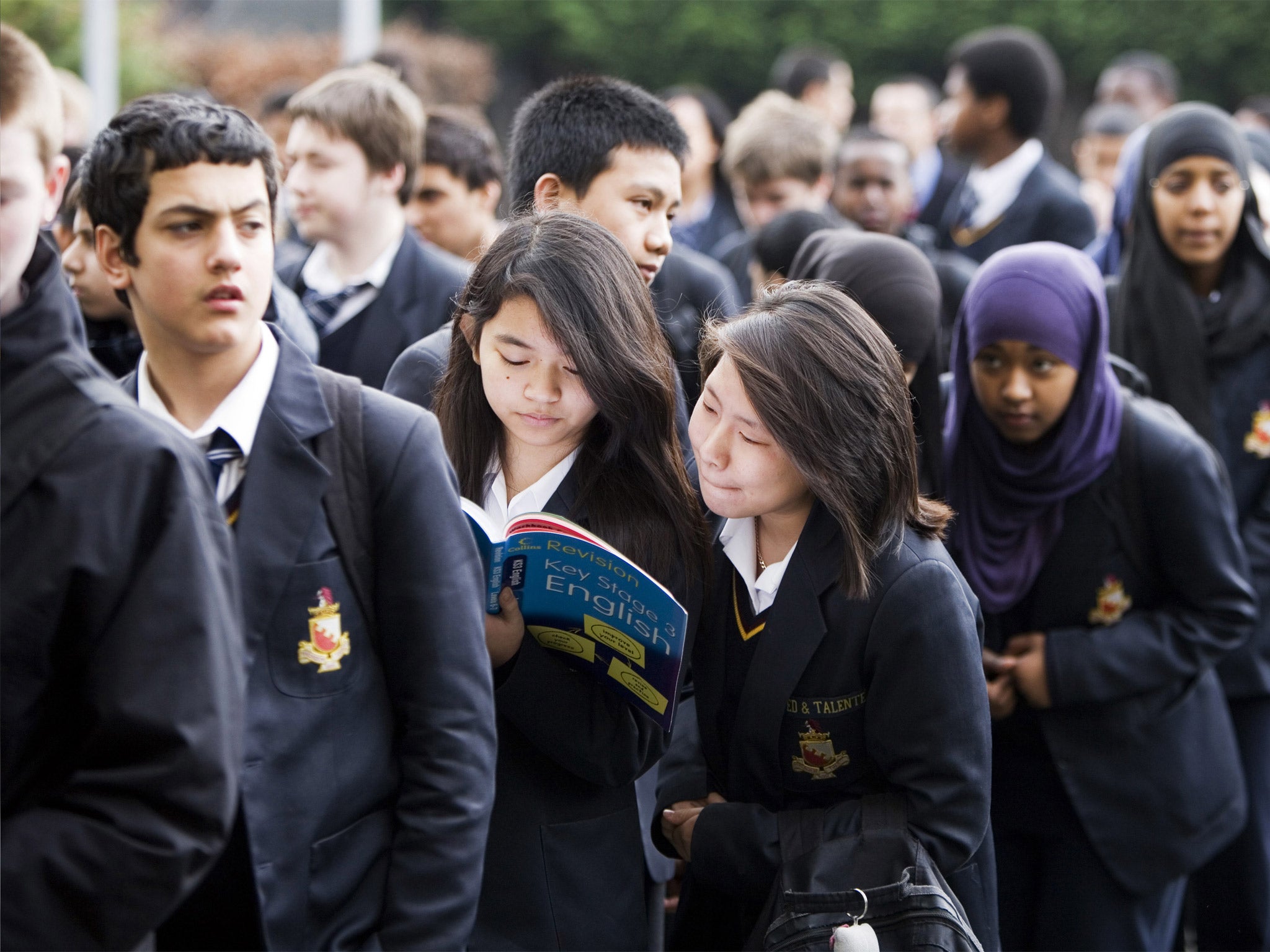 Pupils at Burlington Danes school, near Gove's home (Corbis)