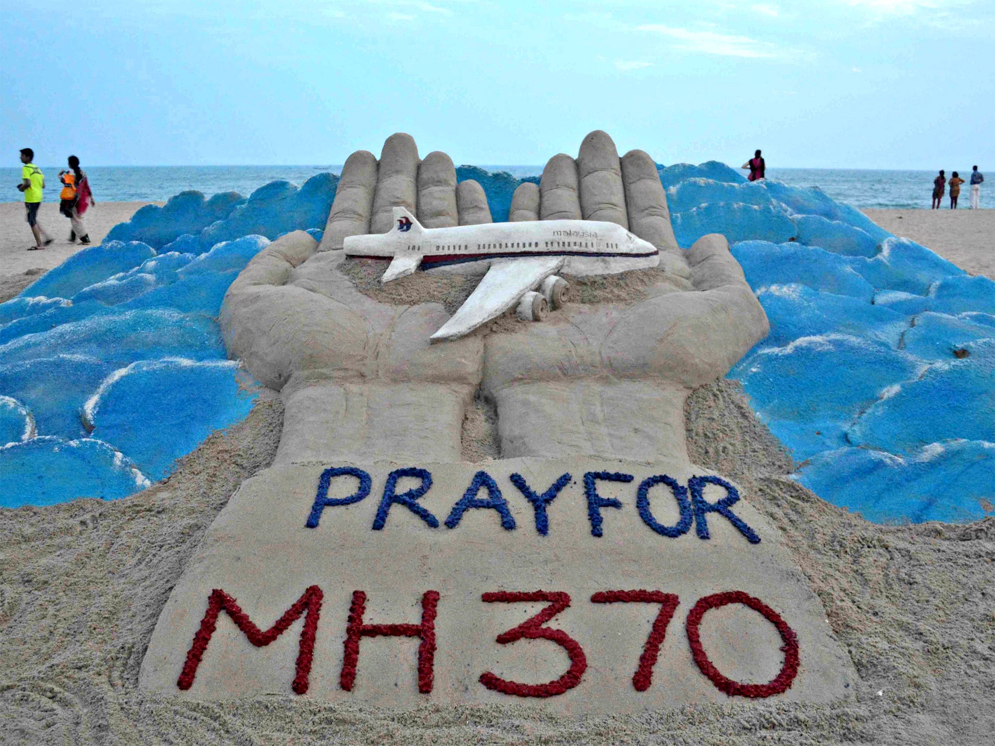 A sand sculpture tribute by the artist Sudarsan Pattnaik on Puri beach in India (Getty)