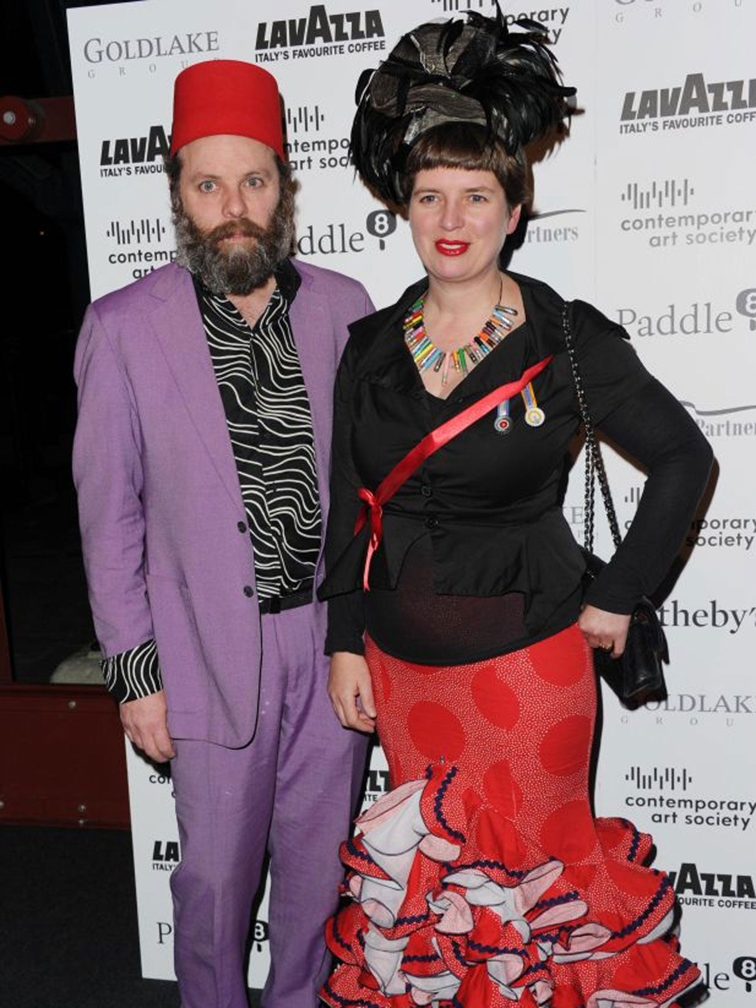 Gavin Turk and Deborah Curtis arrive for the Contemporary Art Society Fundraising Gala at Tobacco Dock on 11 March, 2014 in London, England.