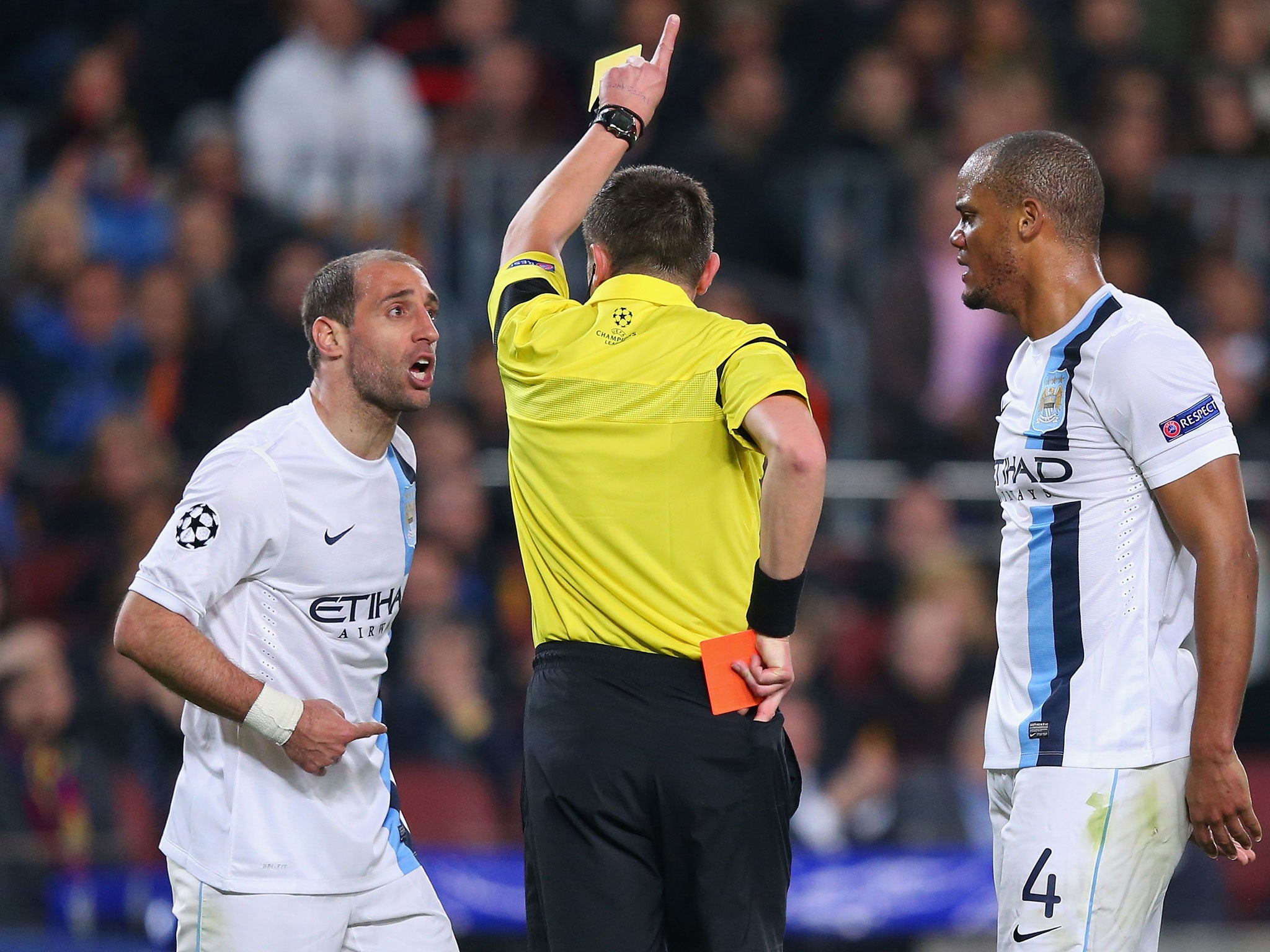 Pablo Zabaleta is shown a red a card by referee Stephane Lannoy (GETTY)