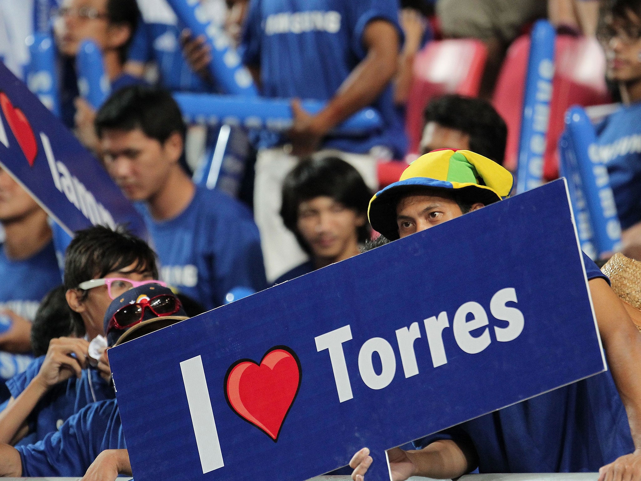 Fans cheer for Chelsea during the pre-season friendly match between the Thailand All Stars and Chelsea at Rajamangala National Stadium on July 24, 2011 in Bangkok