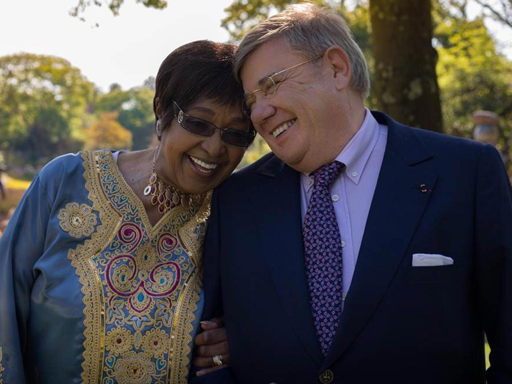 Neither seen nor heard: Jean-Yves Ollivier with Winnie Mandela recently