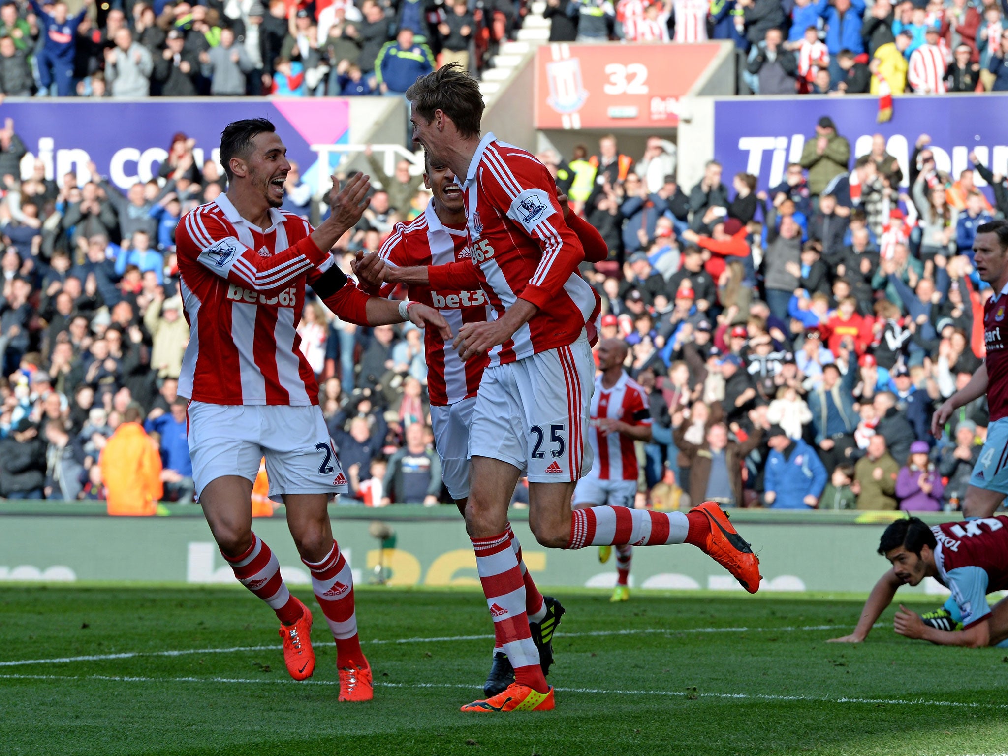 Peter Crouch of Stoke is congratulated after scoring