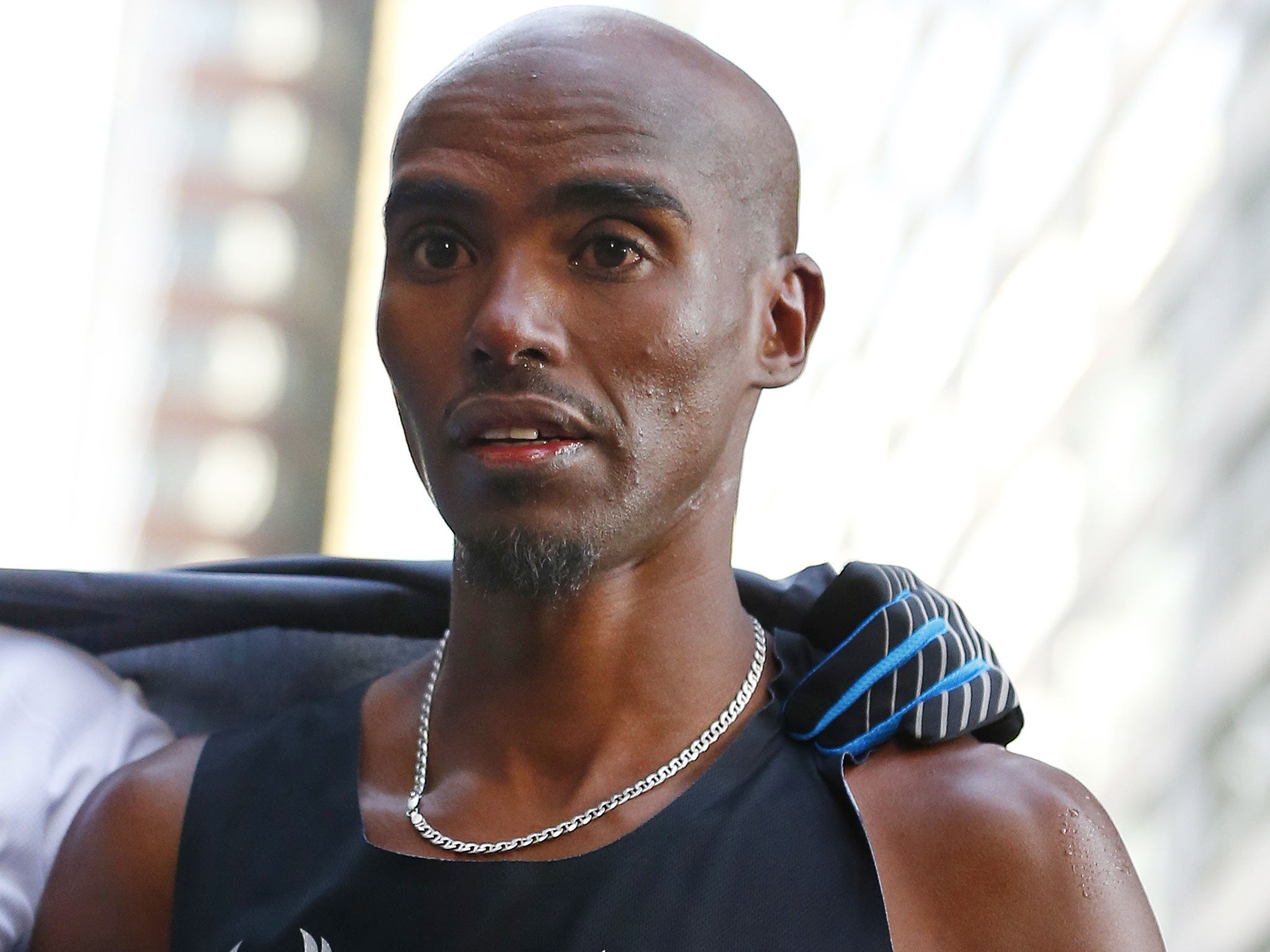 Mo Farah pictured shortly before collapsing at the finish line in New York on Sunday. He recovered to attend the press conference afterwards