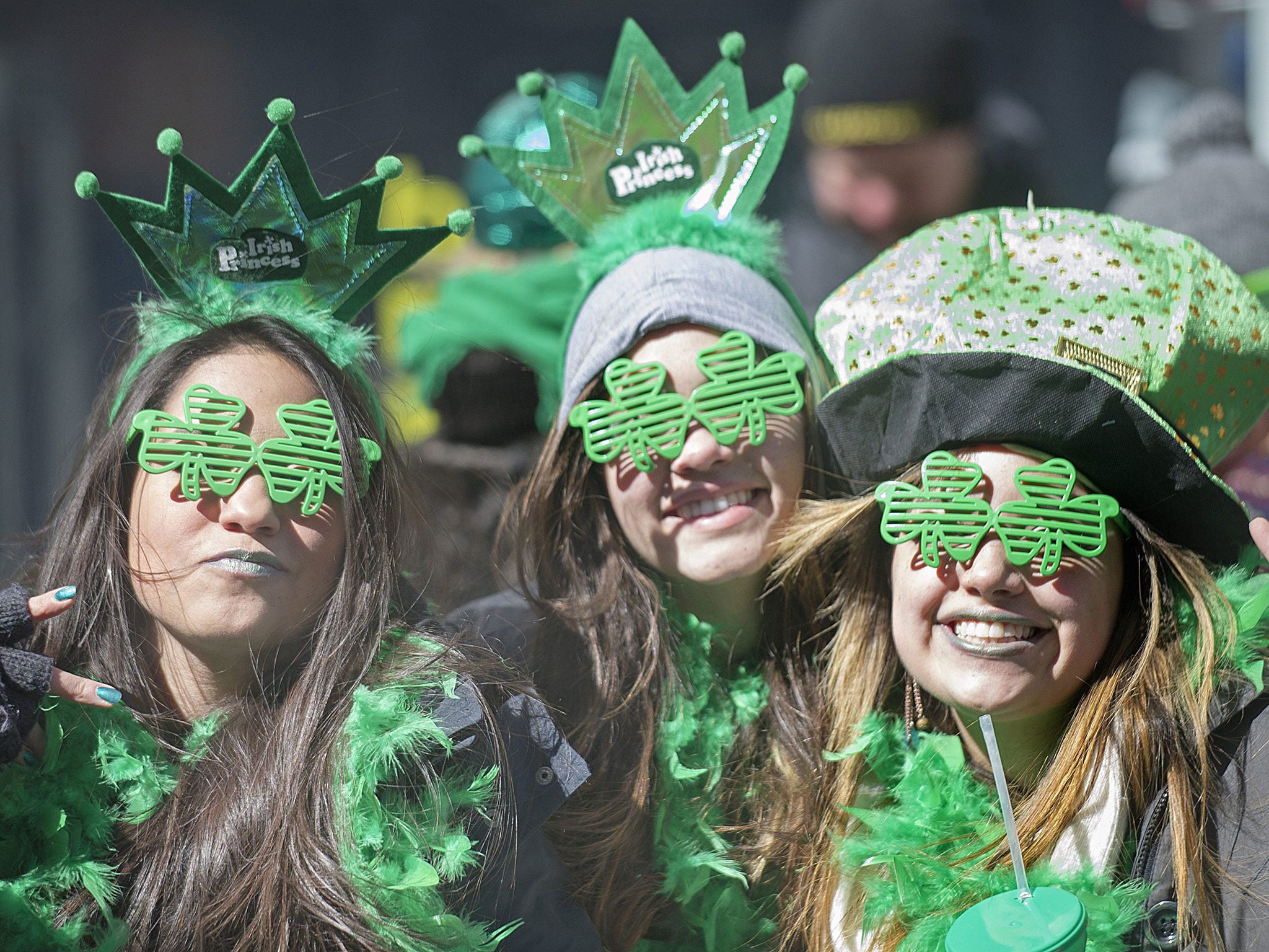 Spectators smile as the watch the annual St. Patrick's Day parade