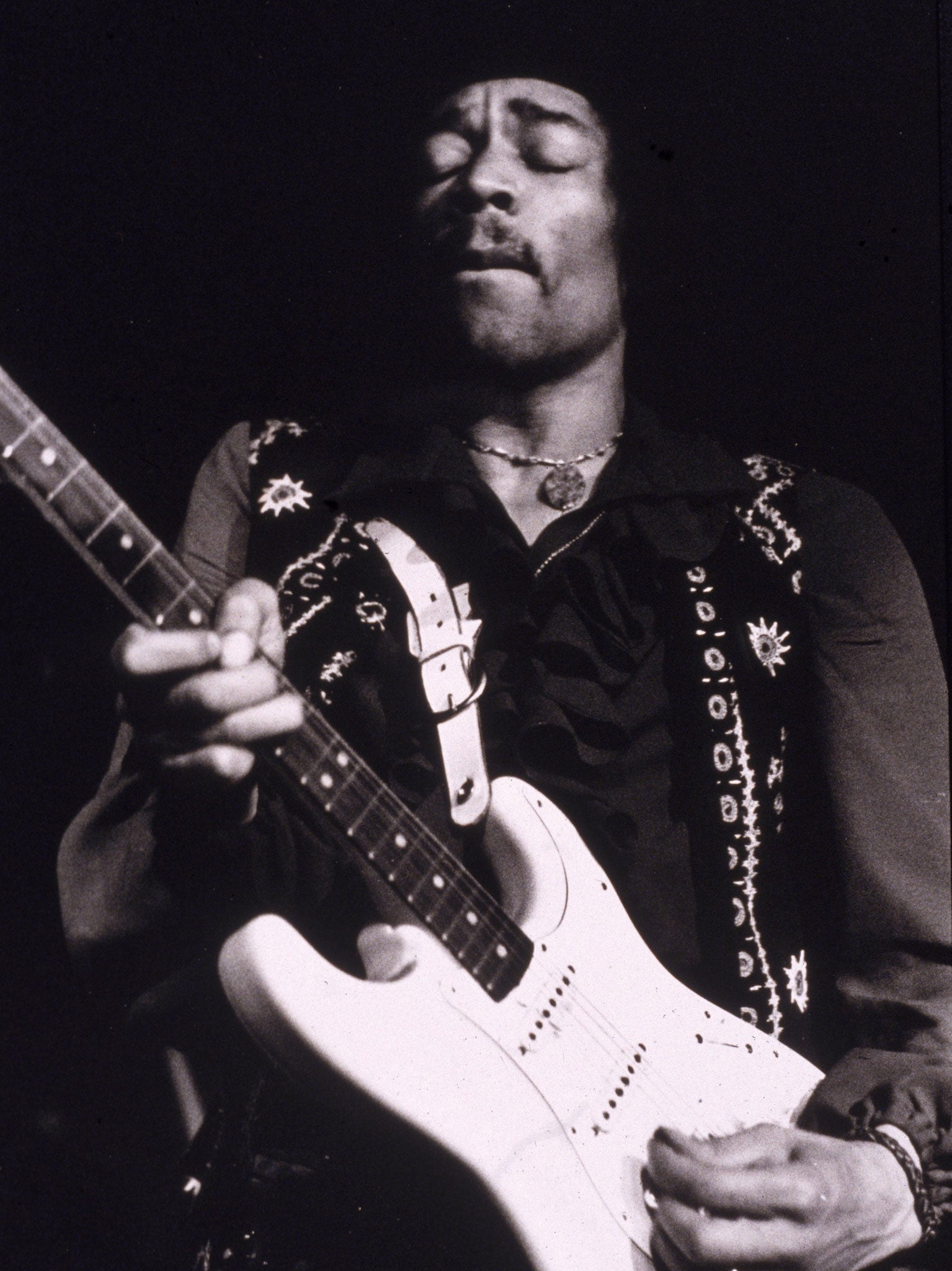 American musician Jimi Hendrix performs onstage, late 1960s.