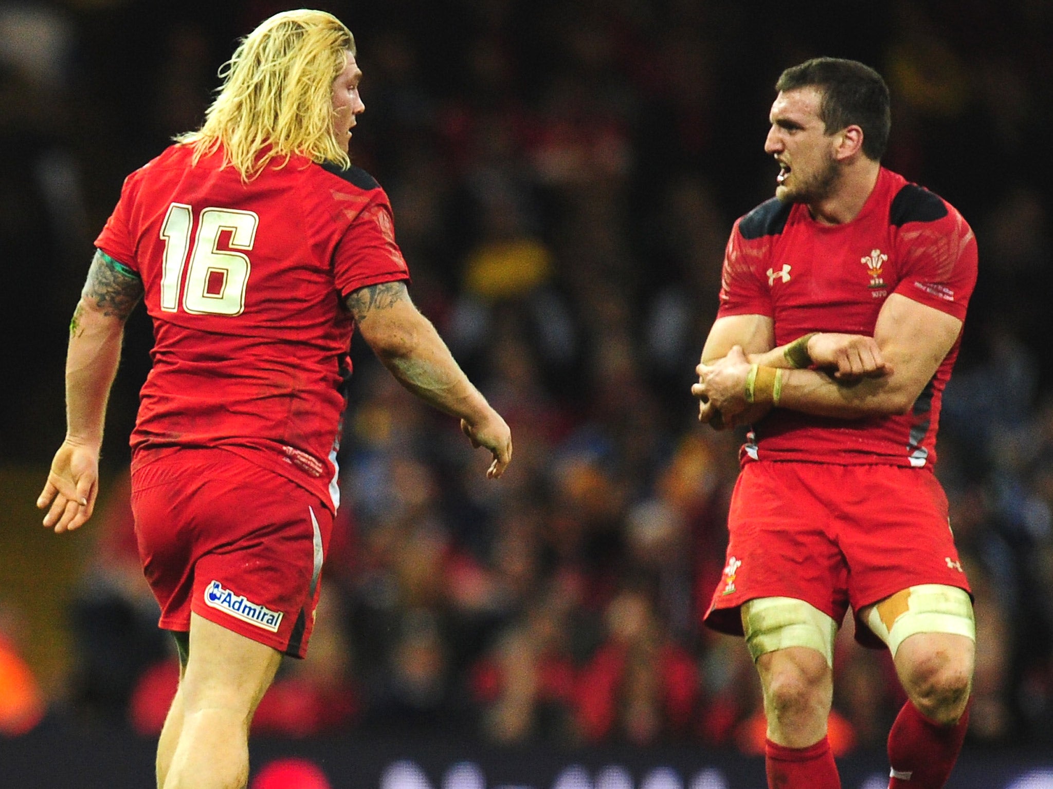 Warburton, right, dislocated his right shoulder in last weekend's Six Nations victory over Scotland