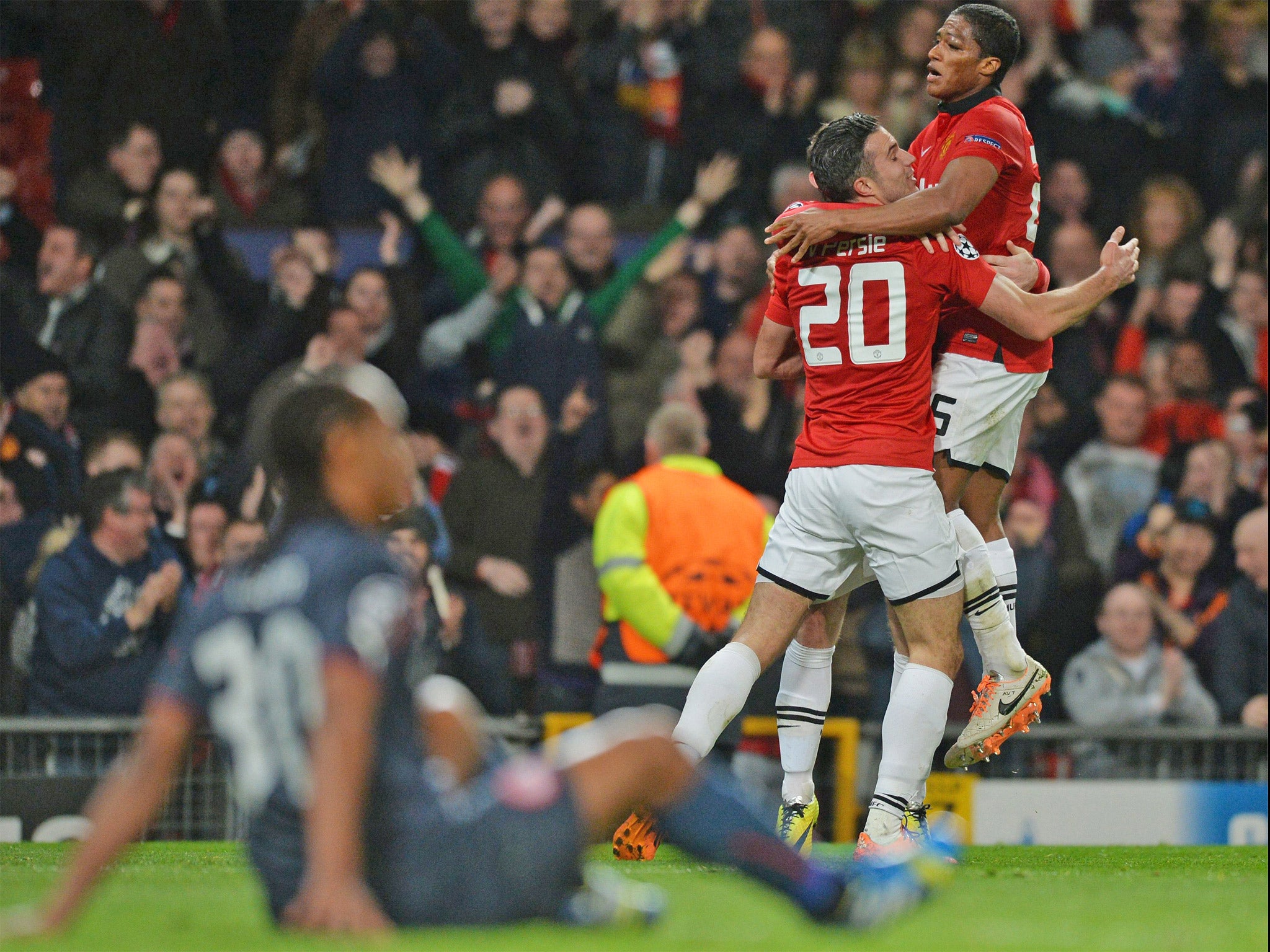 Van Persie celebrates his second with Antonio Valencia (GETTY)