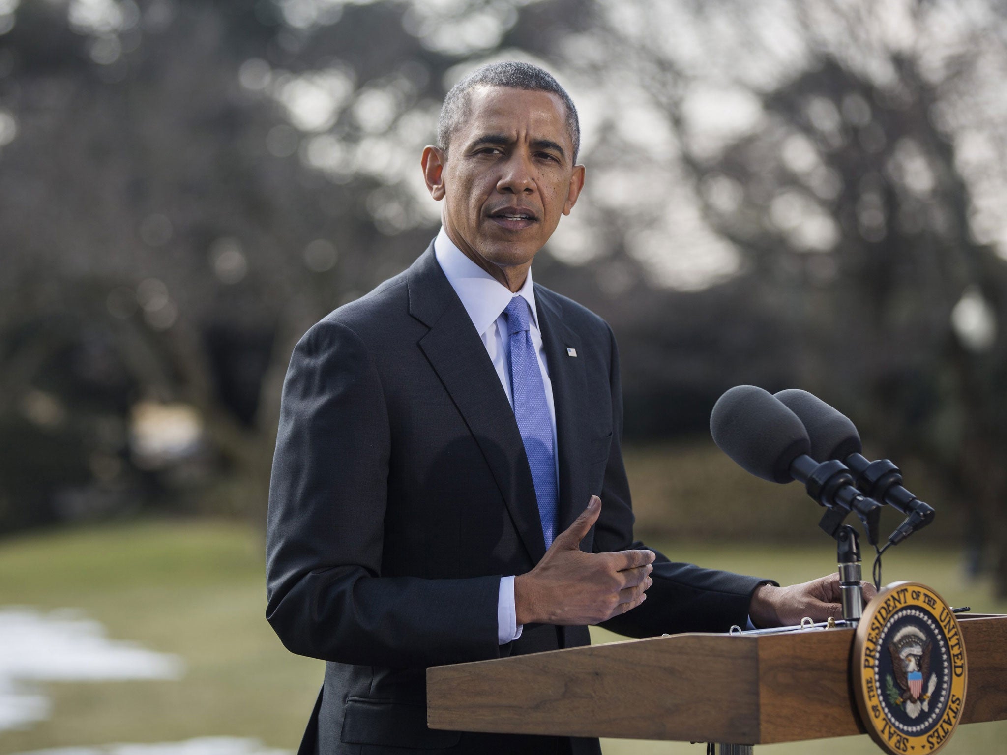 President Barack Obama announces additional sanctions against Russia on the South Lawn of the White House in Washington, DC, USA, 20 March 2014.