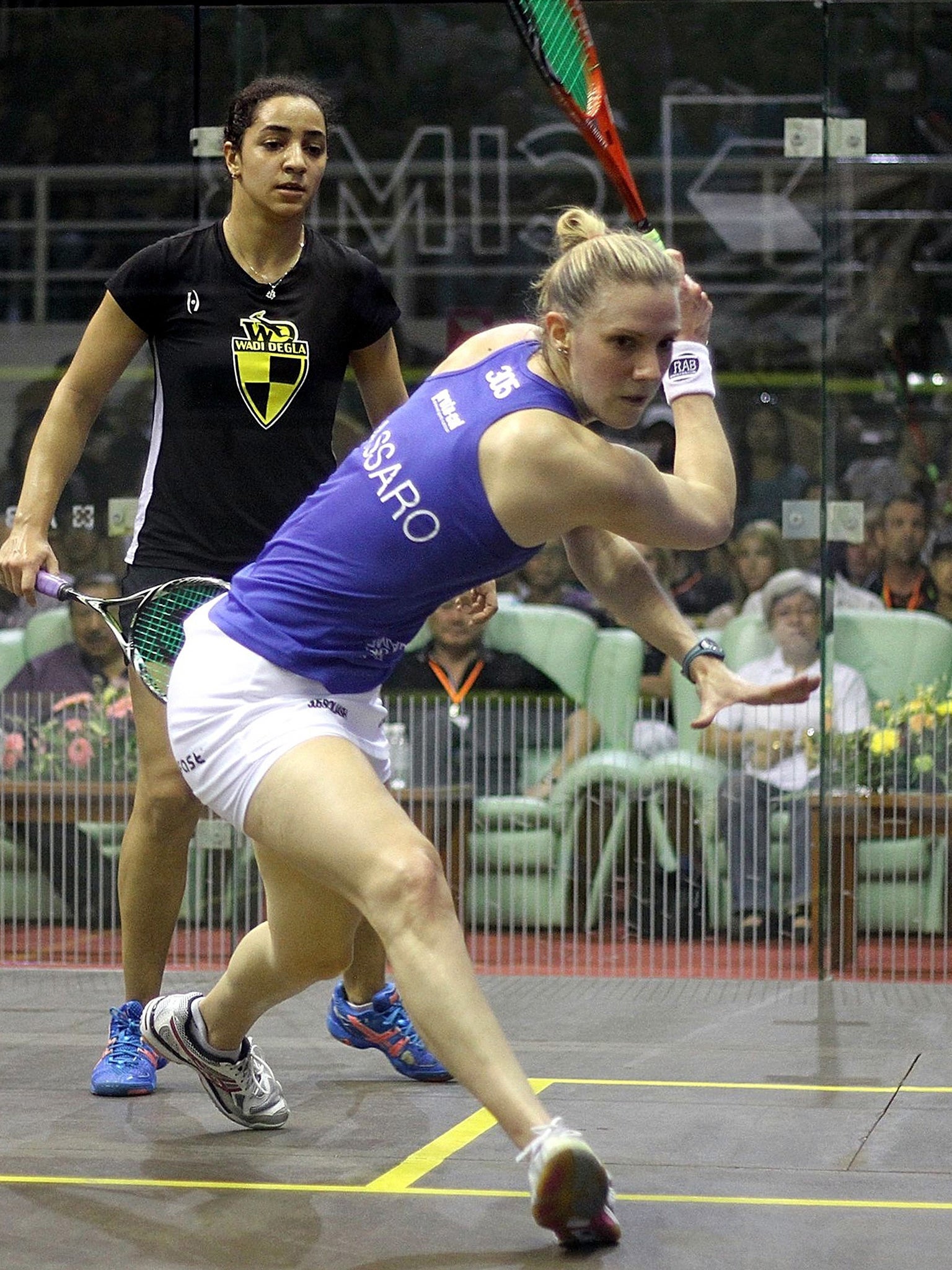 England's Laura Massaro (R) hits a return against Raneem El Weleily of Egypt (L) during their CIMB Women's World Championship semi-final match