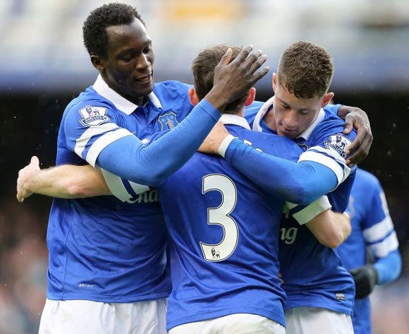 Romelu Lukaku and Ross Barkley congratulate Leighton Baines after his goal for Everton against Swansea earlier this season