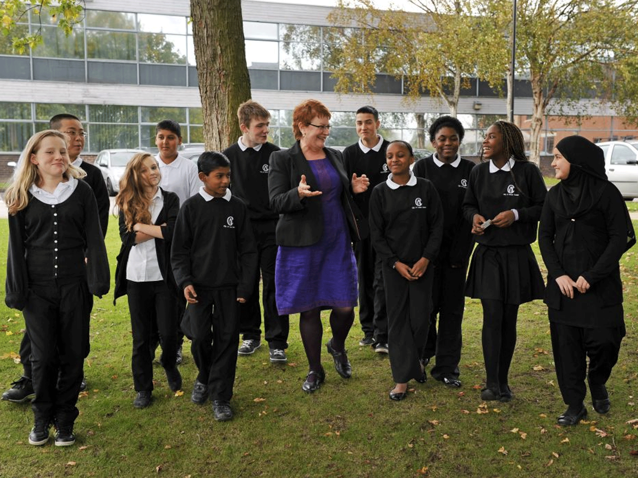 Georgiana Sale with pupils from City of Leeds School, which has children from 55 different countries