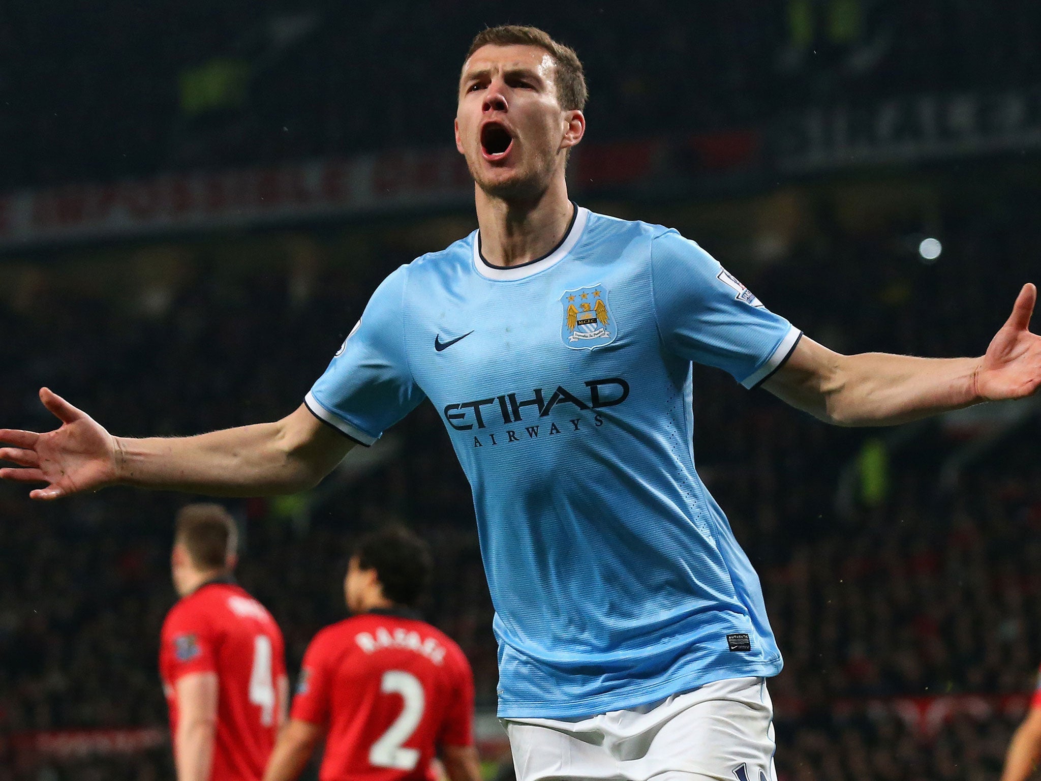 Edin Dzeko celebrates his second goal for Manchester City