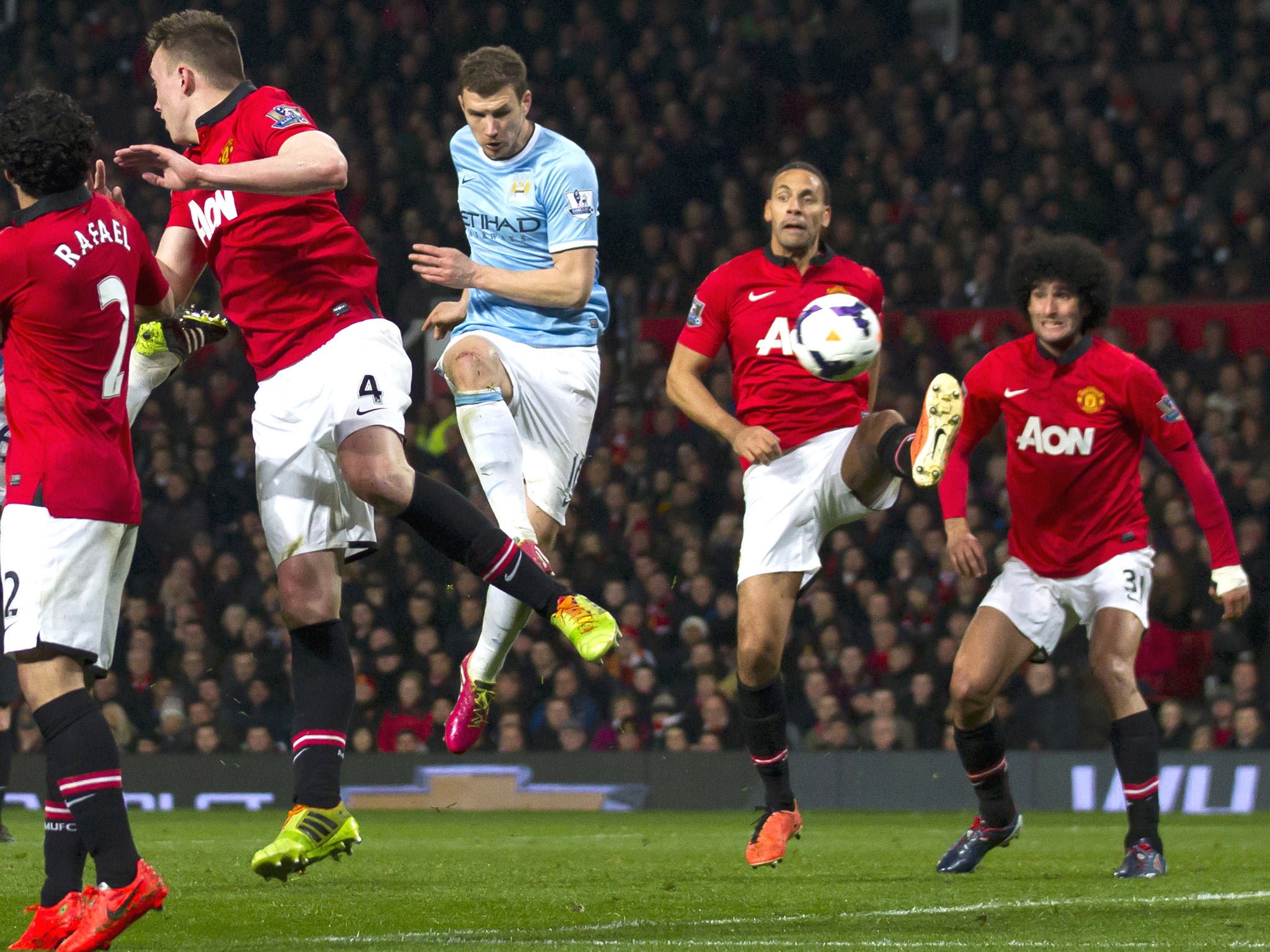 Edin Dzeko turns in his, and City's, second goal