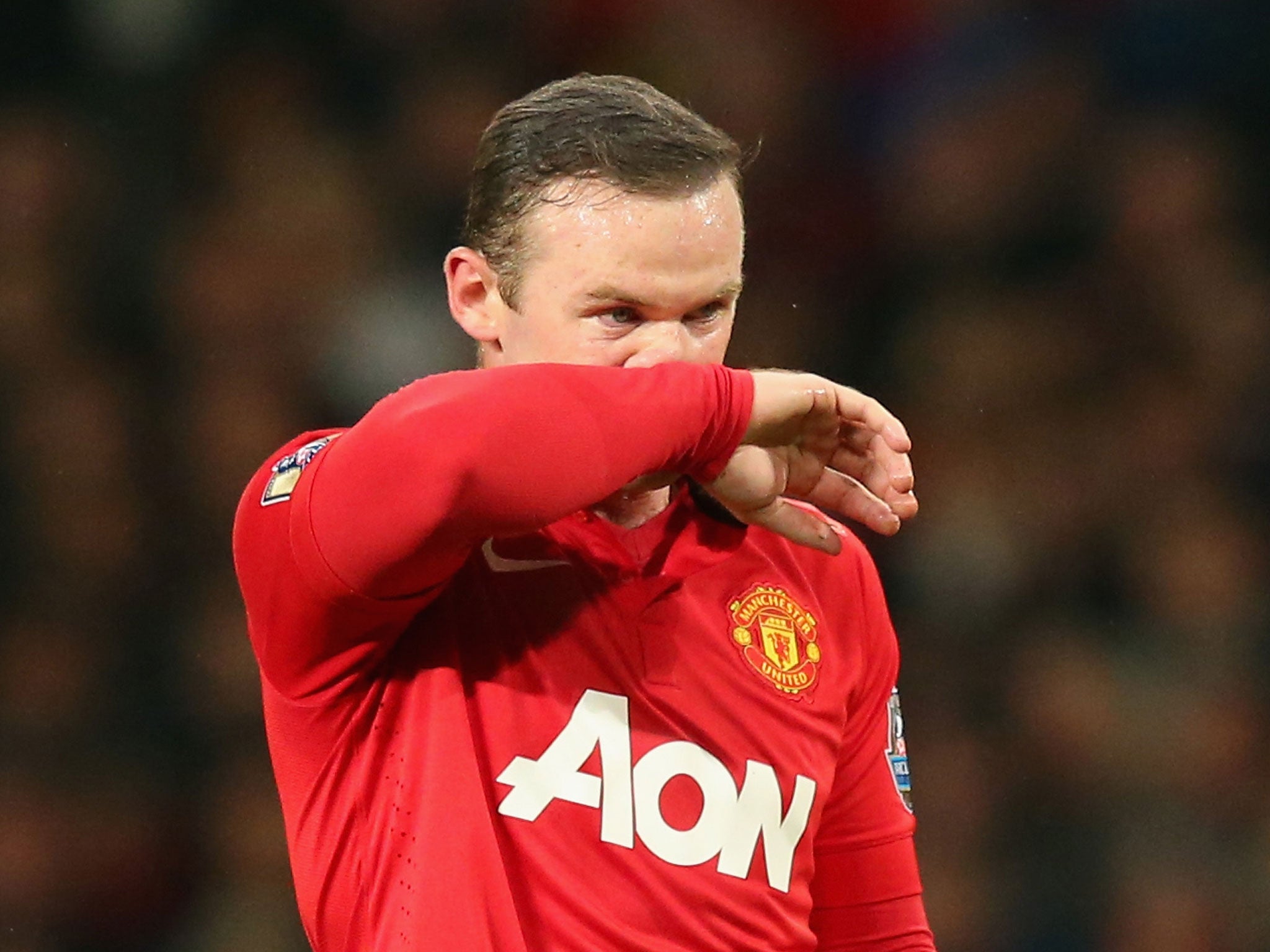 Wayne Rooney looks on at Old Trafford