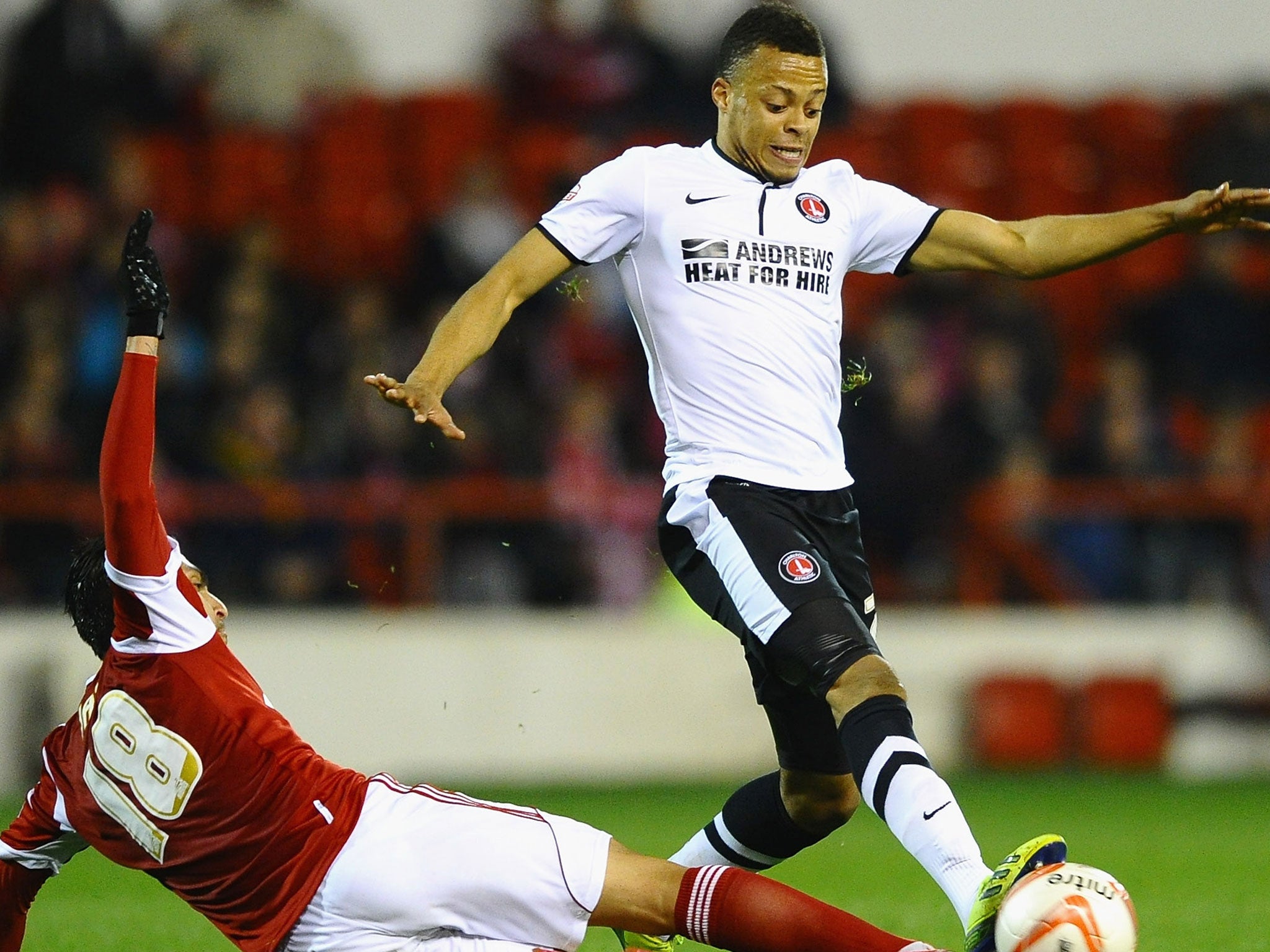 Jordan Cousins (right) competes for the ball for Charlton against Nottingham Forest