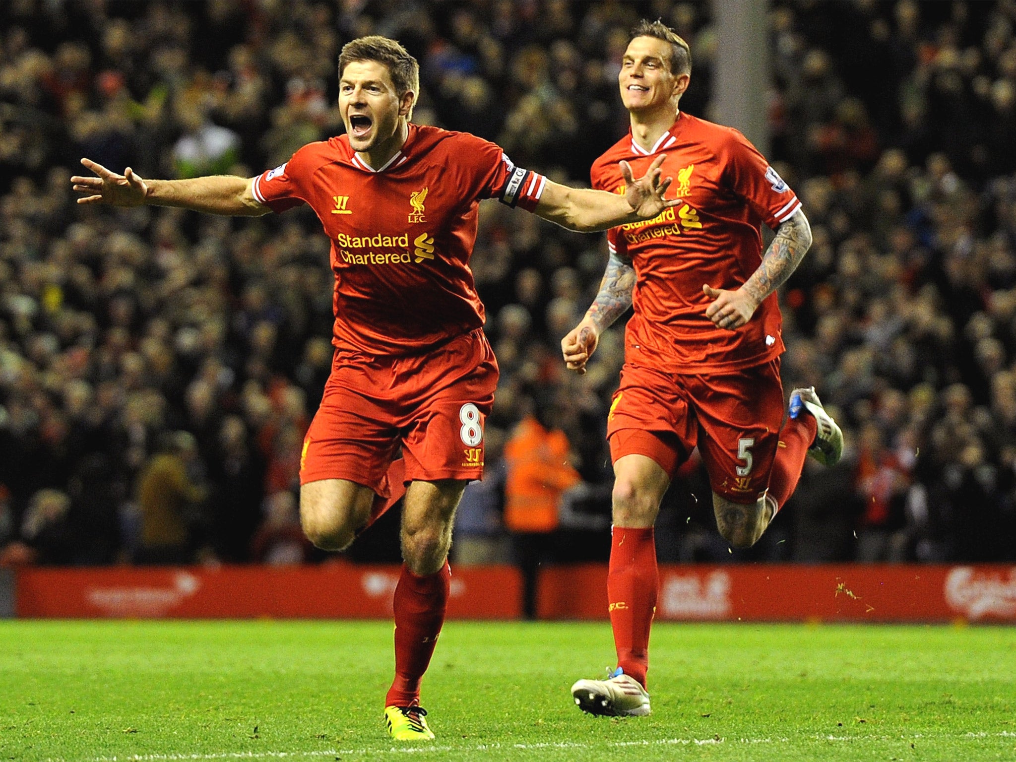 Steven Gerrard celebrates with Jordan Henderson after opening the scoring