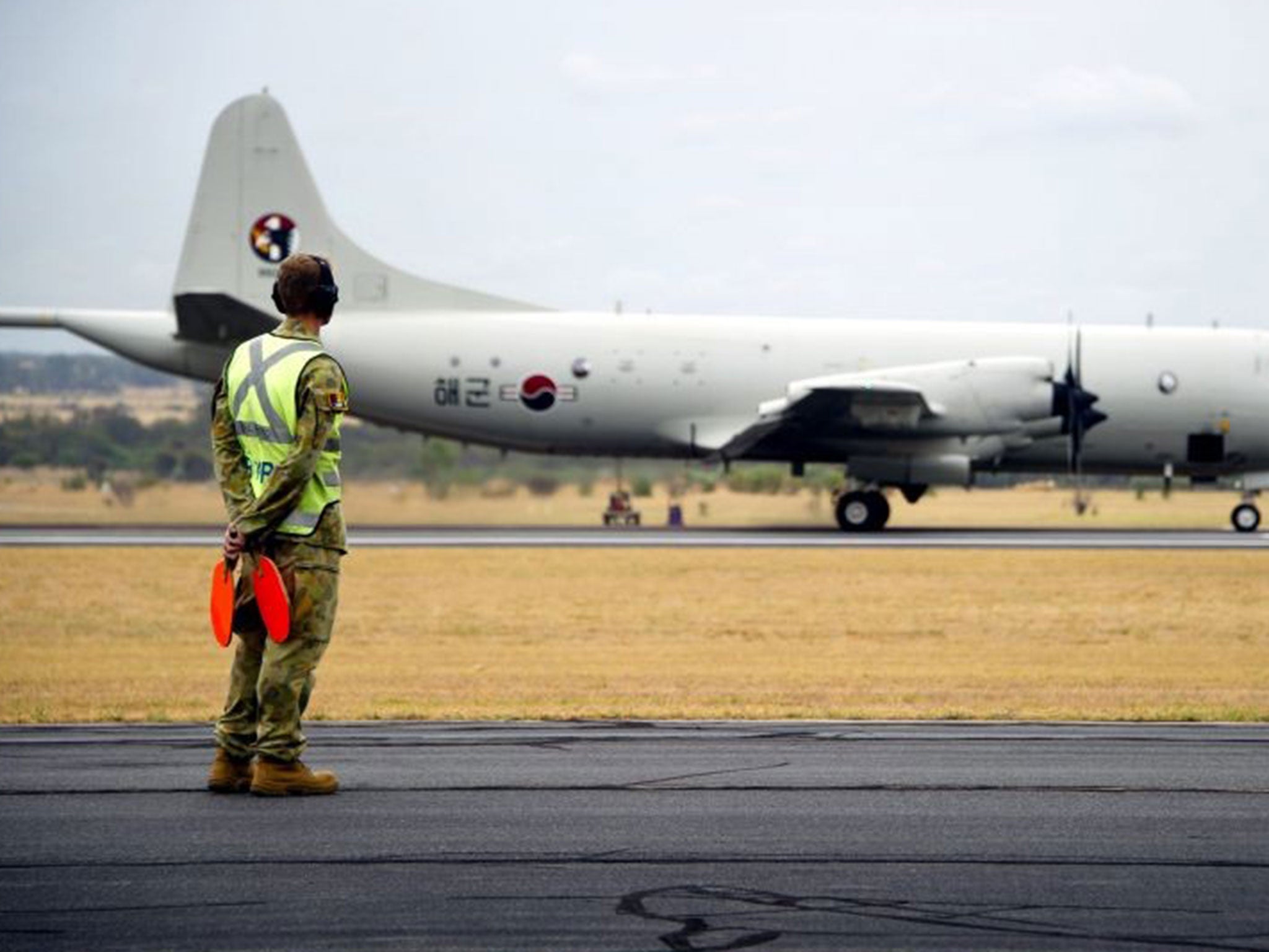 Handout photo of Republic of Korea Navy aircraft arriving to participate in search for missing Malaysia Airlines Flight MH370