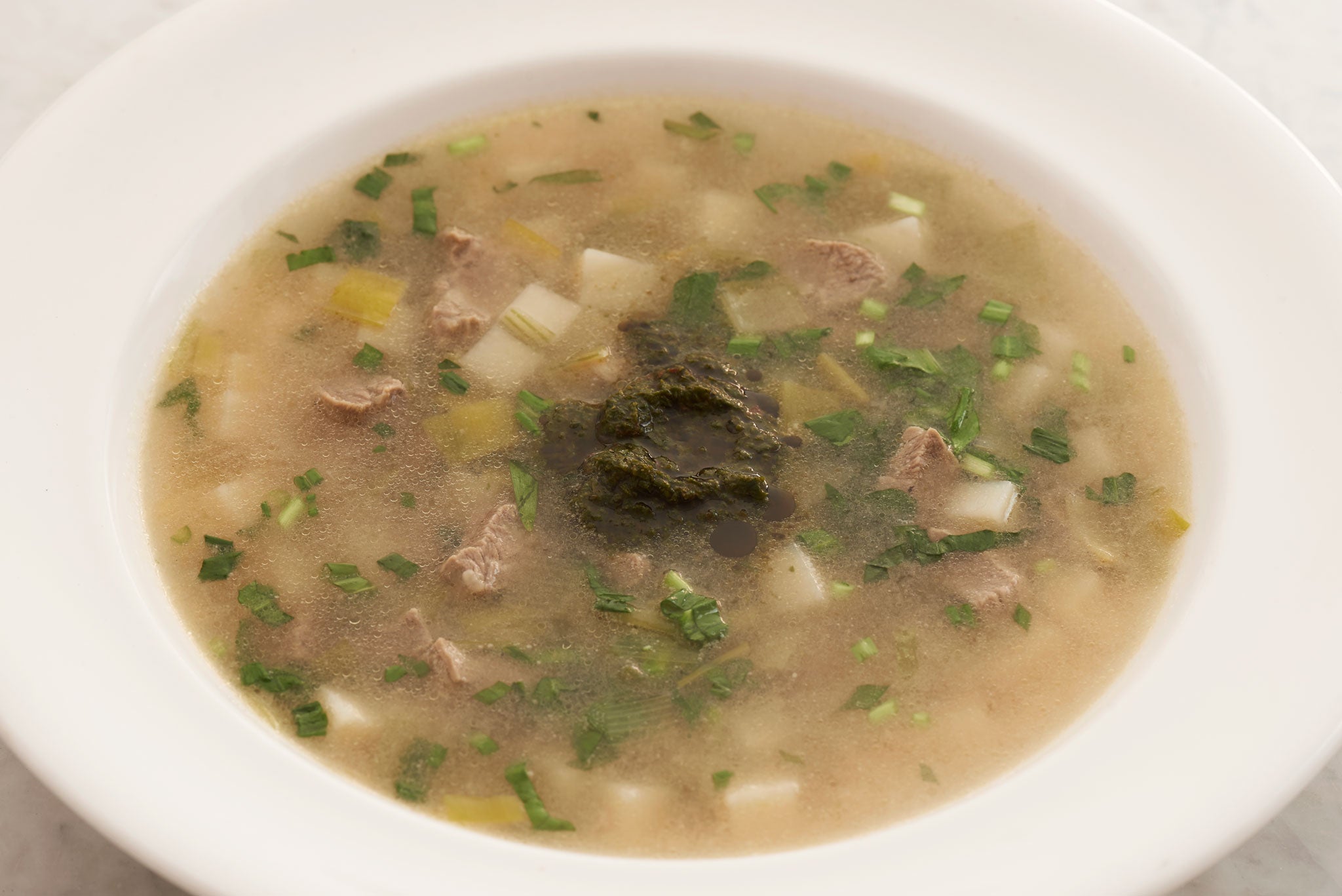 This mutton and wild garlic broth makes the most of an inexpensive cut