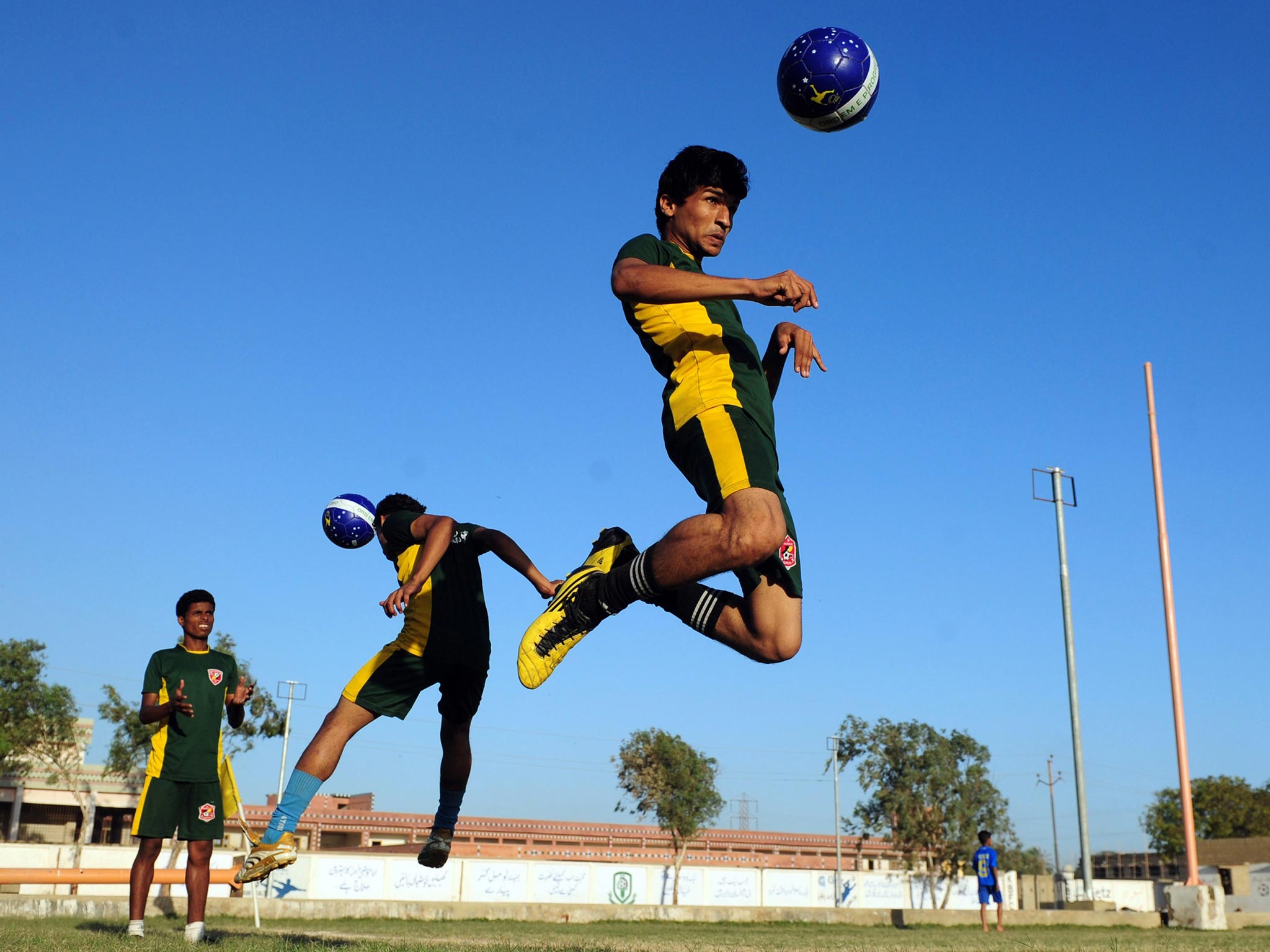 Young players practise ahead of the Street Child World Cup in Rio