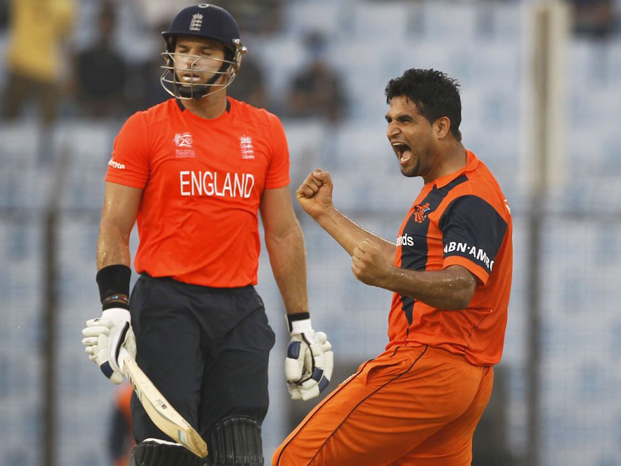 Michael Lumb cannot watch as he falls to Mudassar Bukhari in Chittagong yesterday as England were bowled out for 88