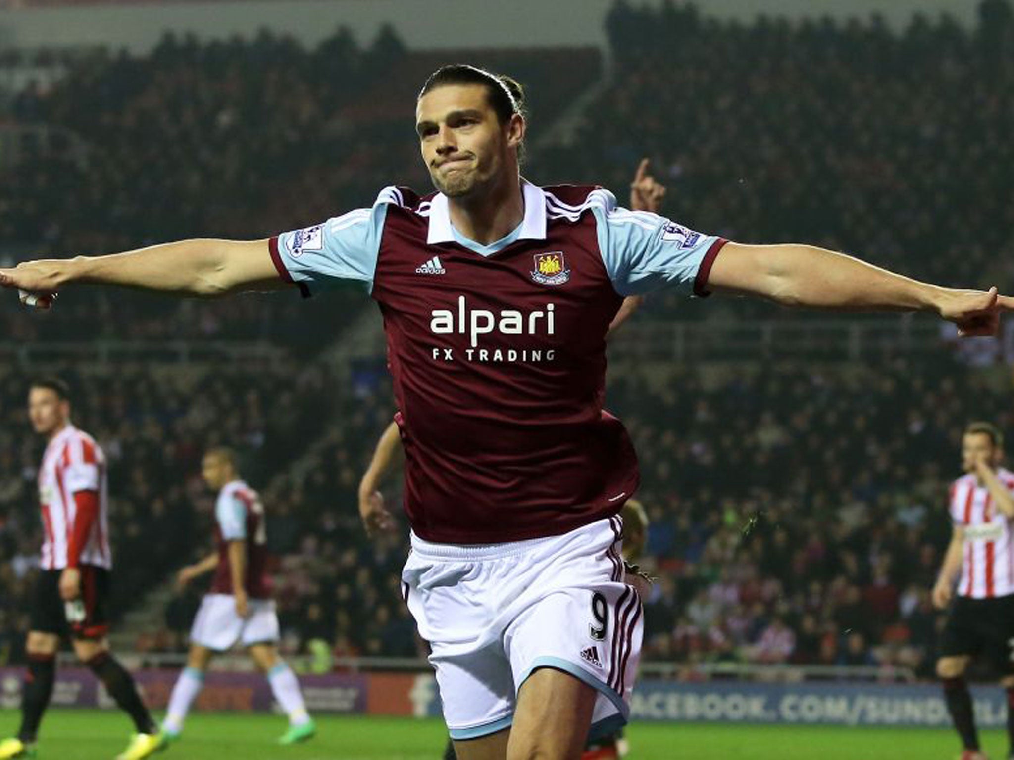 Andy Caroll celebrates after his header opened the scoring last night