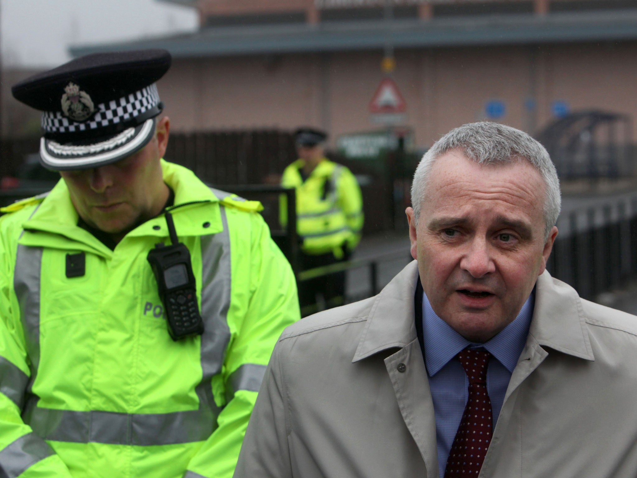 Andy Gray (right), Edinburgh Council's head of schools, gives a statement outside Liberton High School