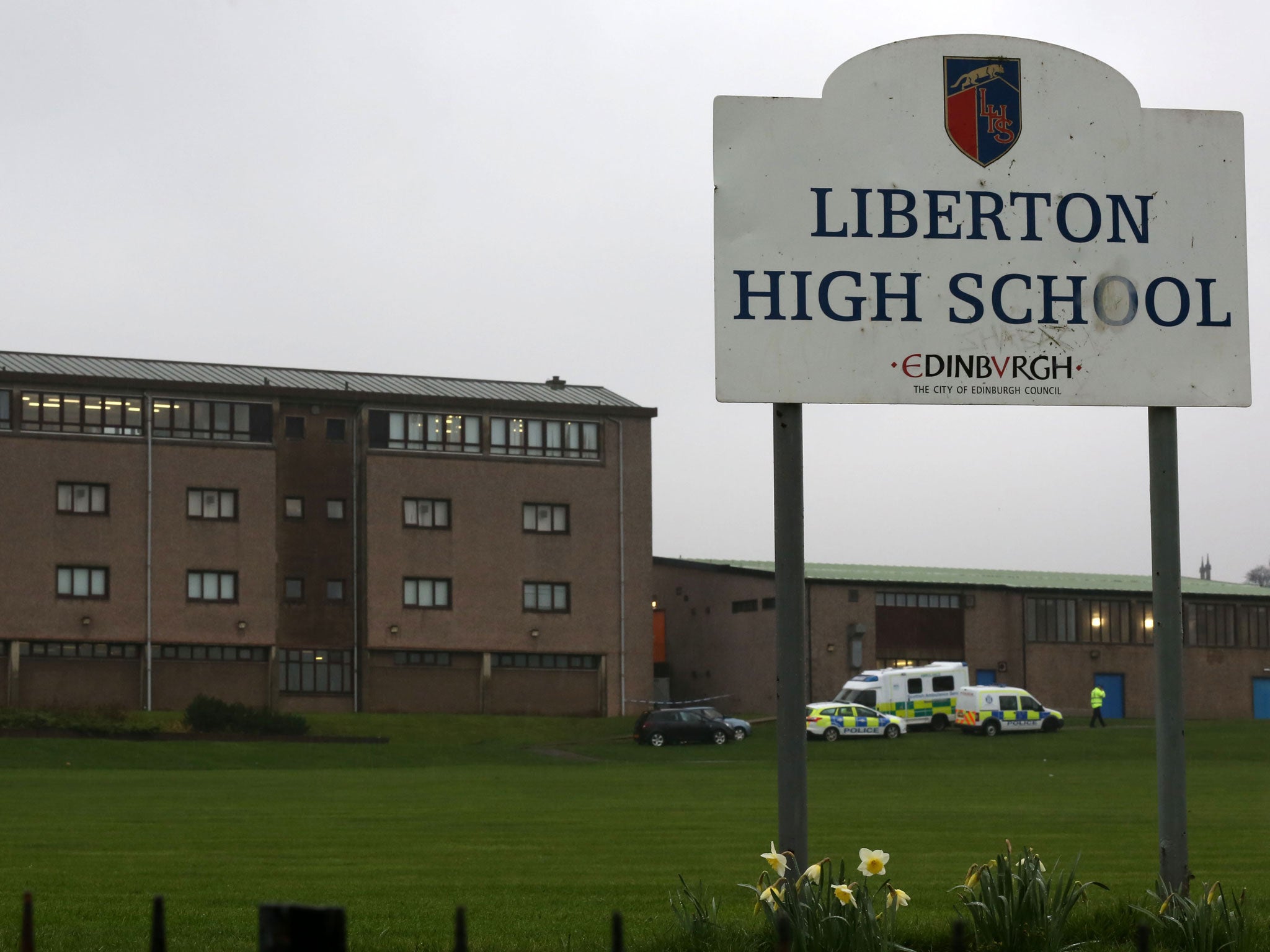 Police at Liberton High School in Edinburgh where a pupil died after a wall inside the school collapsed onto her