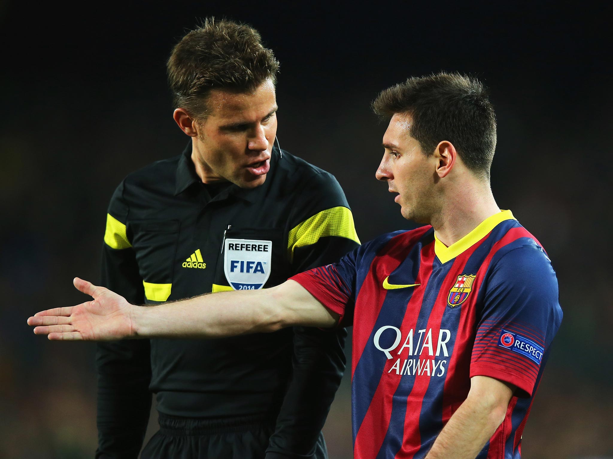 Lionel Messi remonstrates with the referee during Barcelona's 1-1 draw with Atletico Madrid in the Champions League quarter-final first leg.