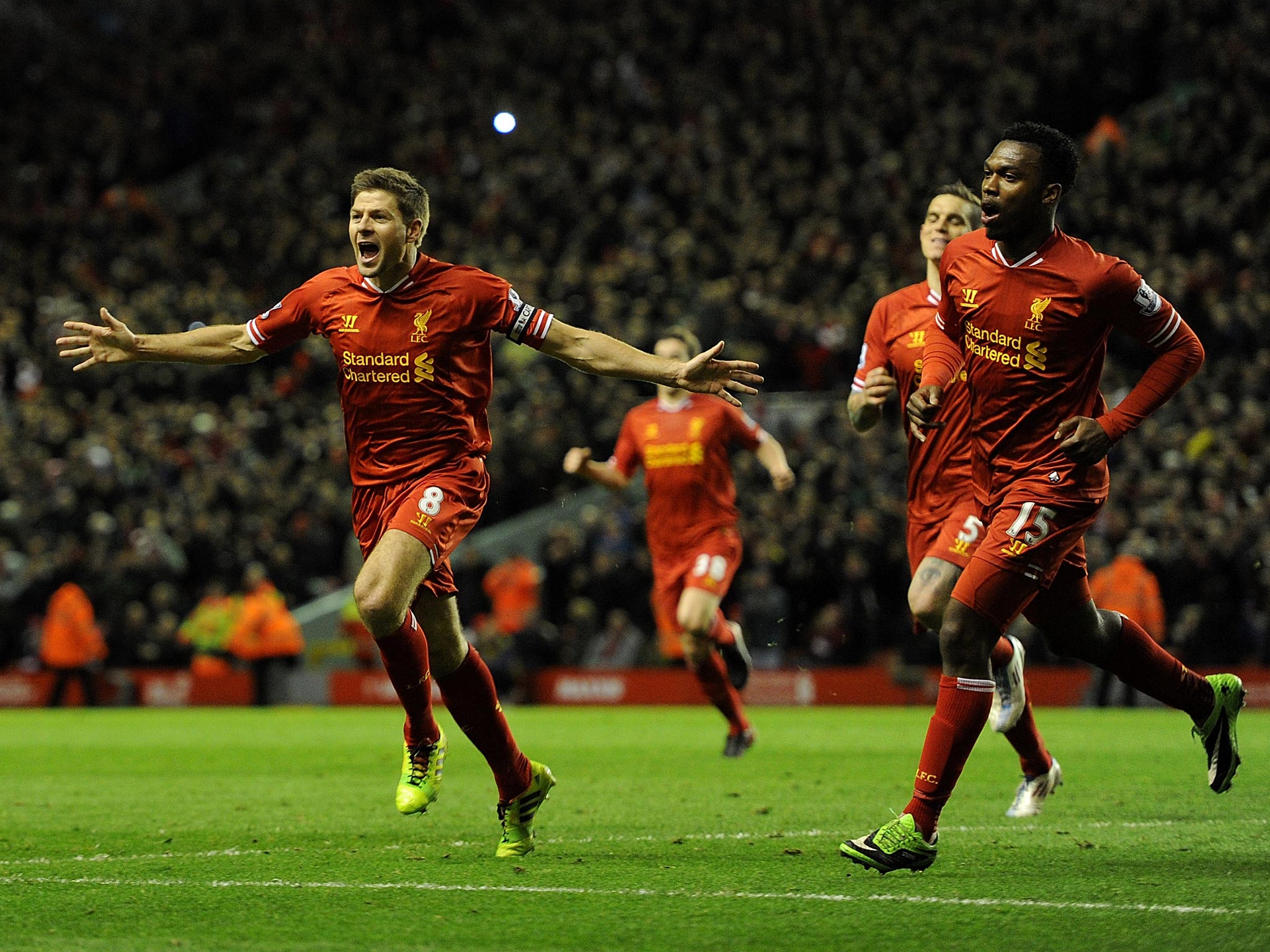 Steven Gerrard celebrates alongside Daniel Sturridge after scoring for Liverpool against Sunderland